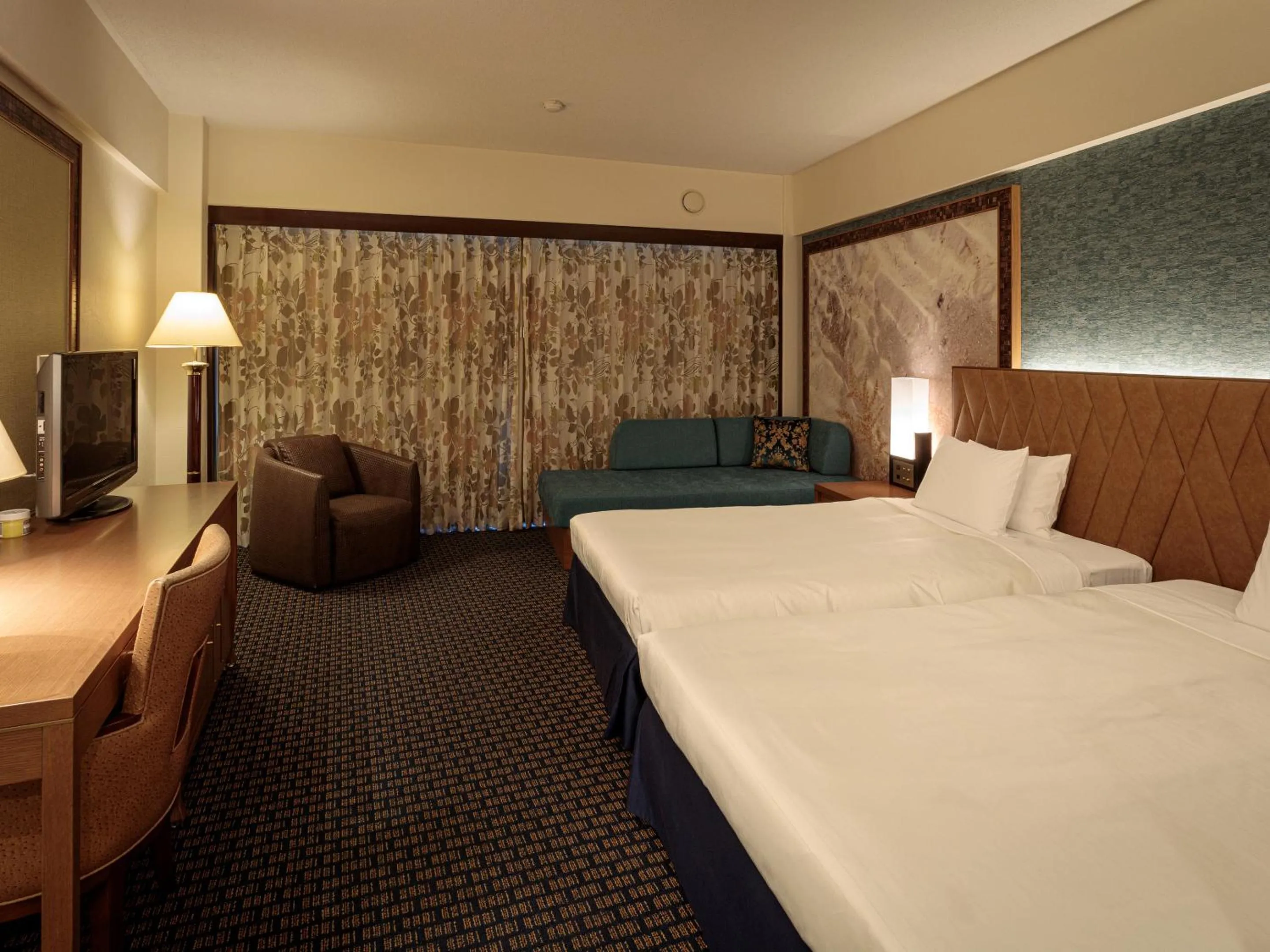 Bed in Okinawa Kariyushi Beach Resort Ocean Spa