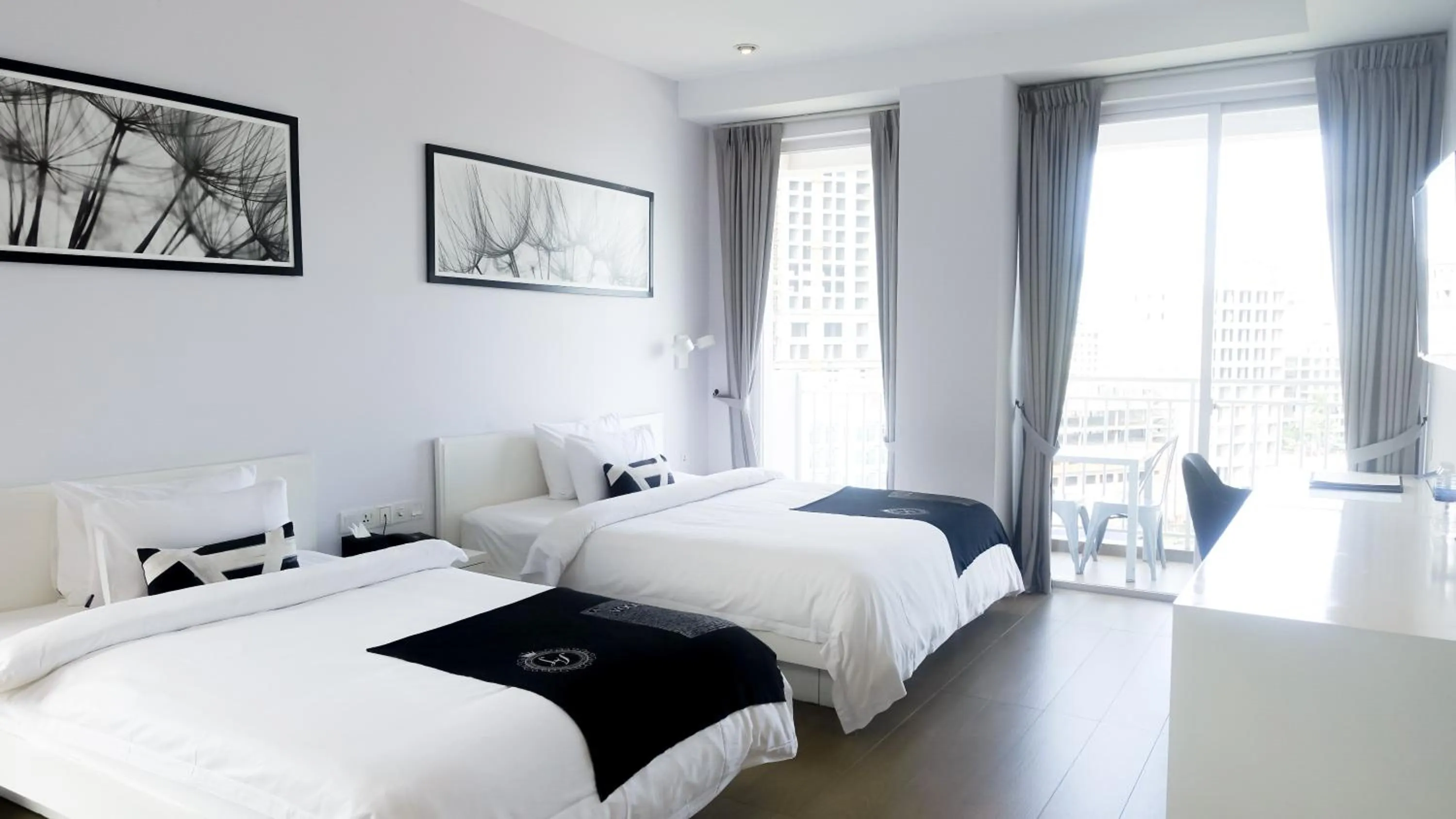 Bed in La Vogue Boutique Hotel & Casino