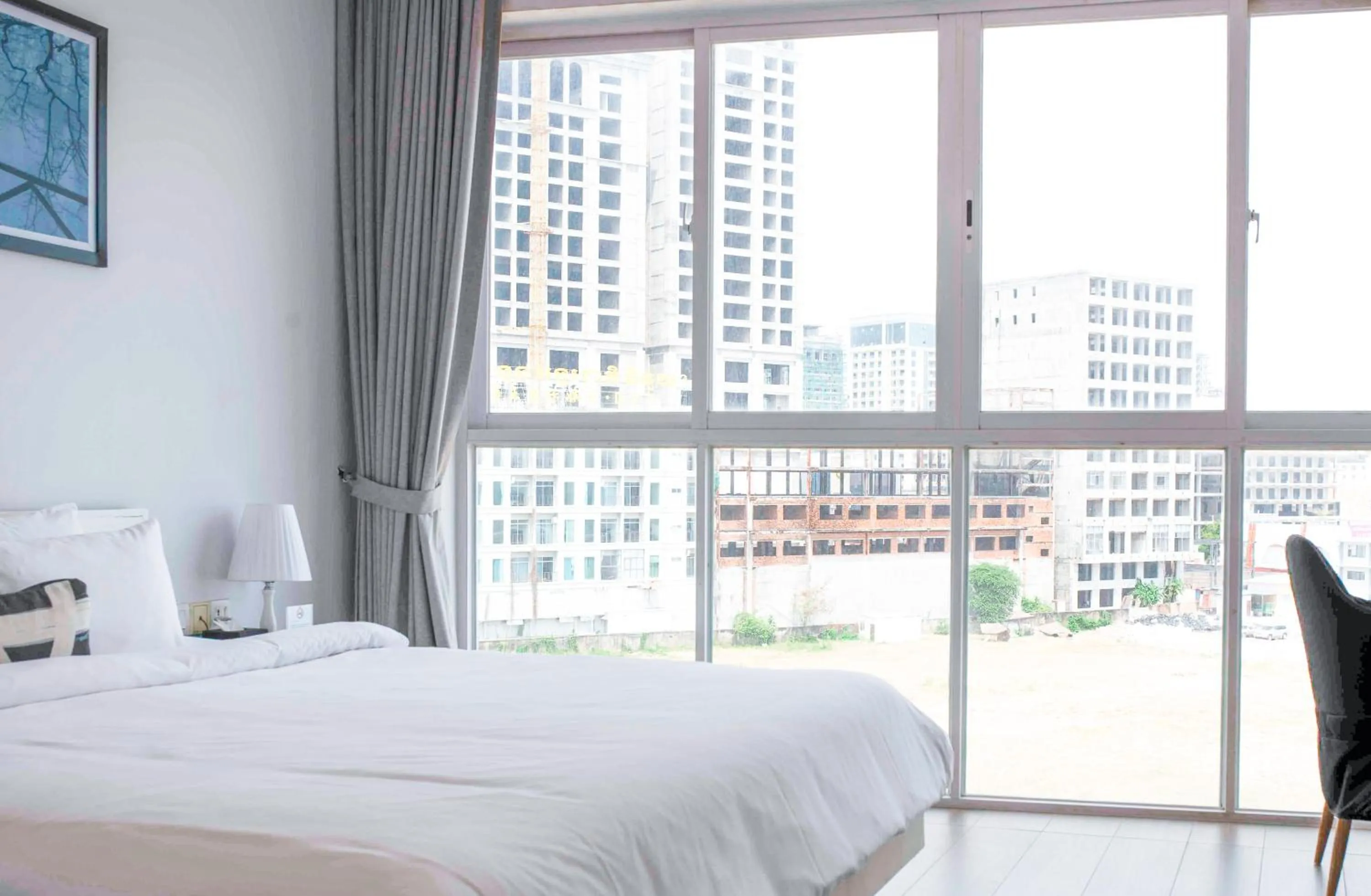 Bed in La Vogue Boutique Hotel & Casino