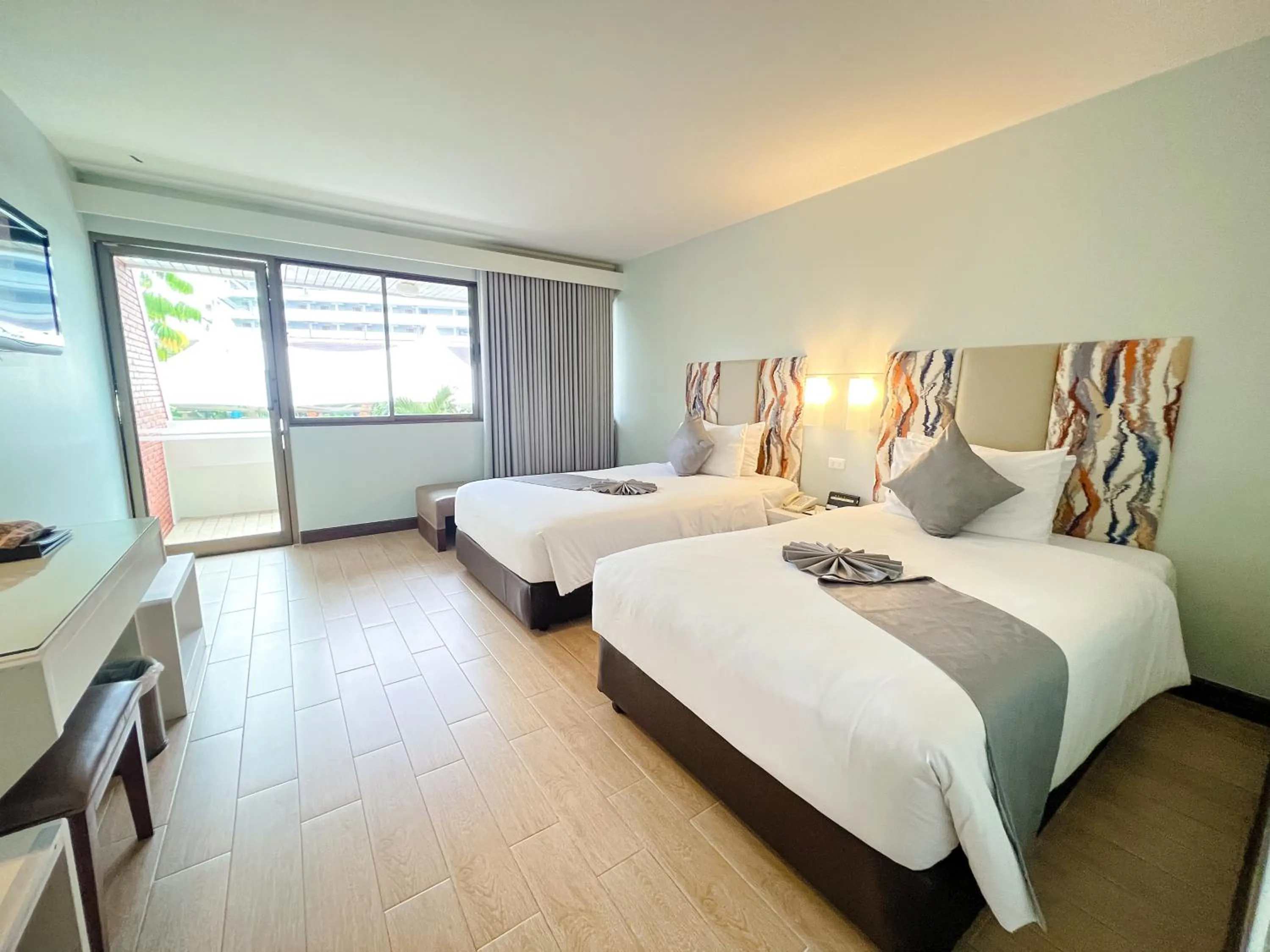 Bed in Patong Resort Hotel - SHA Extra Plus