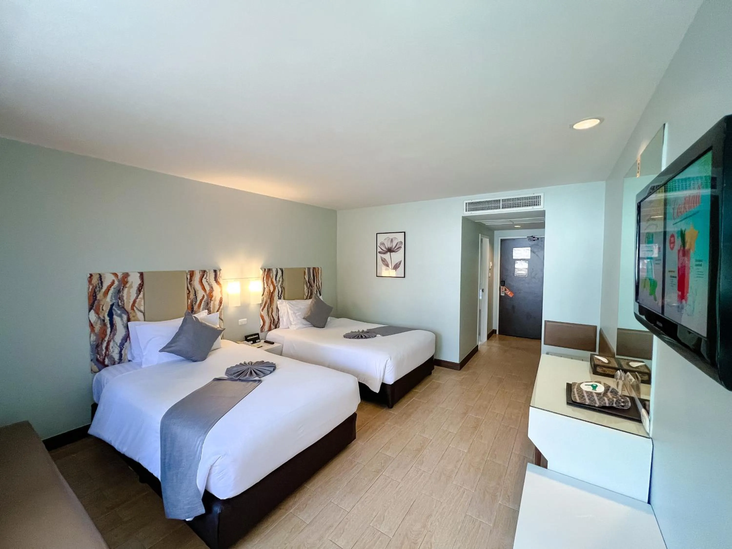 Bed in Patong Resort Hotel - SHA Extra Plus