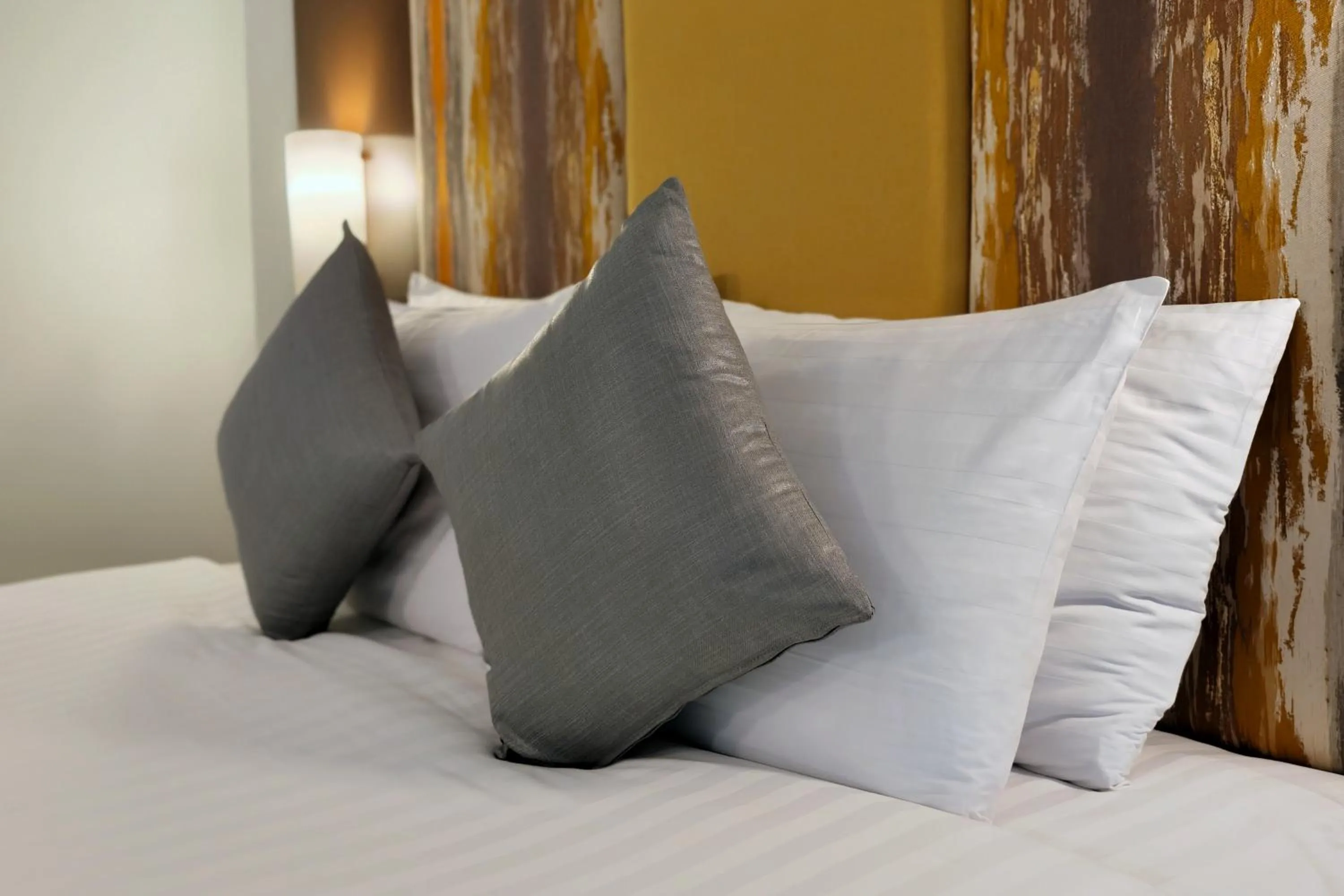 Bed in Patong Resort Hotel - SHA Extra Plus