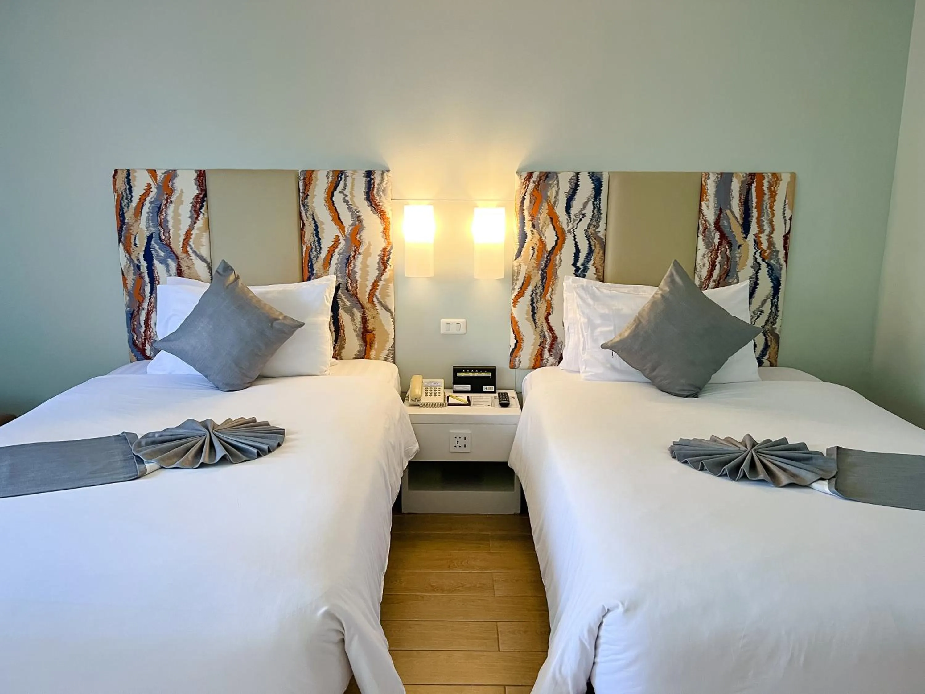 Bed in Patong Resort Hotel - SHA Extra Plus