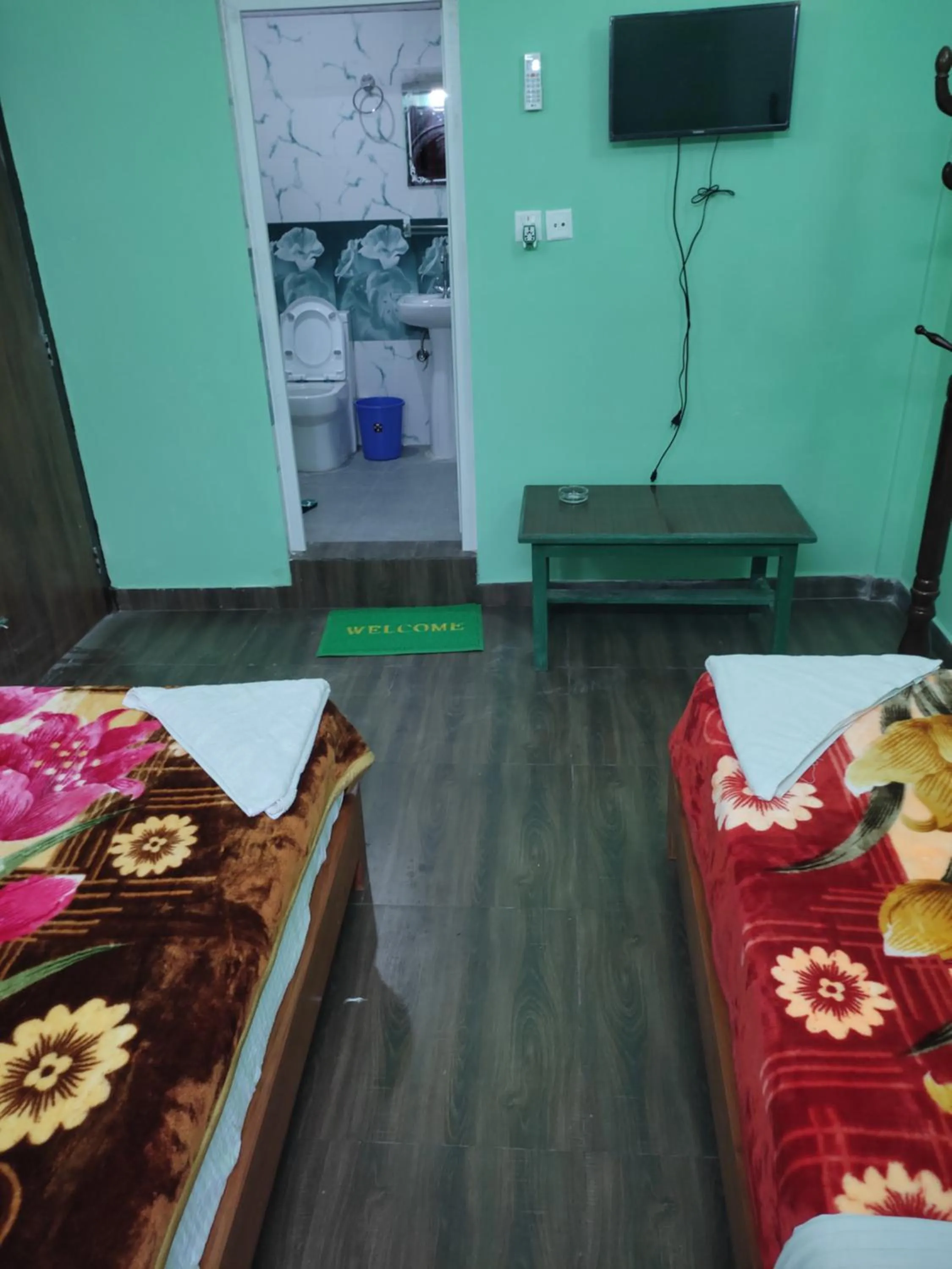 Photo of the whole room, Bed in Harry Guest House & Restaurant