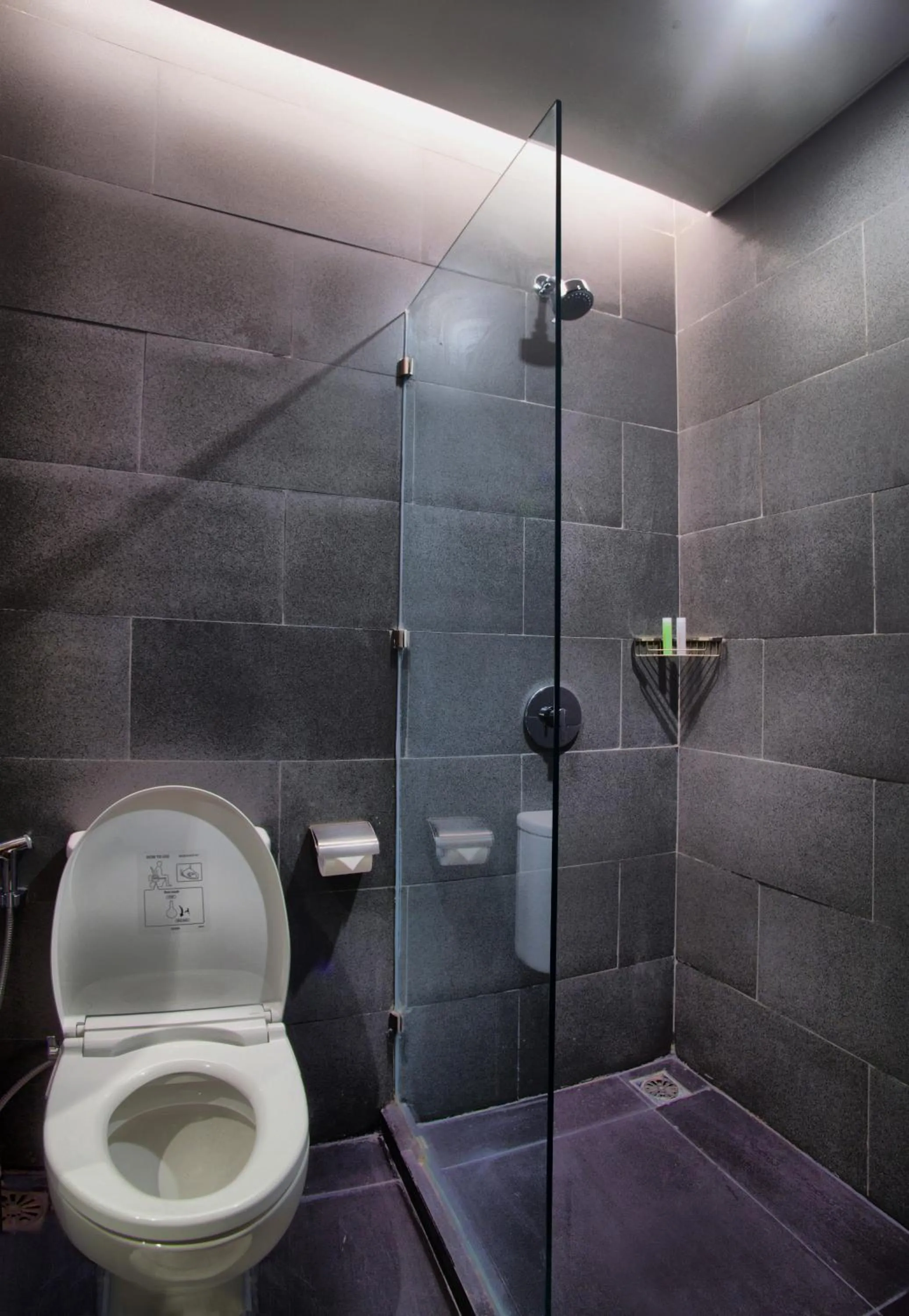 Bathroom in Golden Tulip Essential Makassar