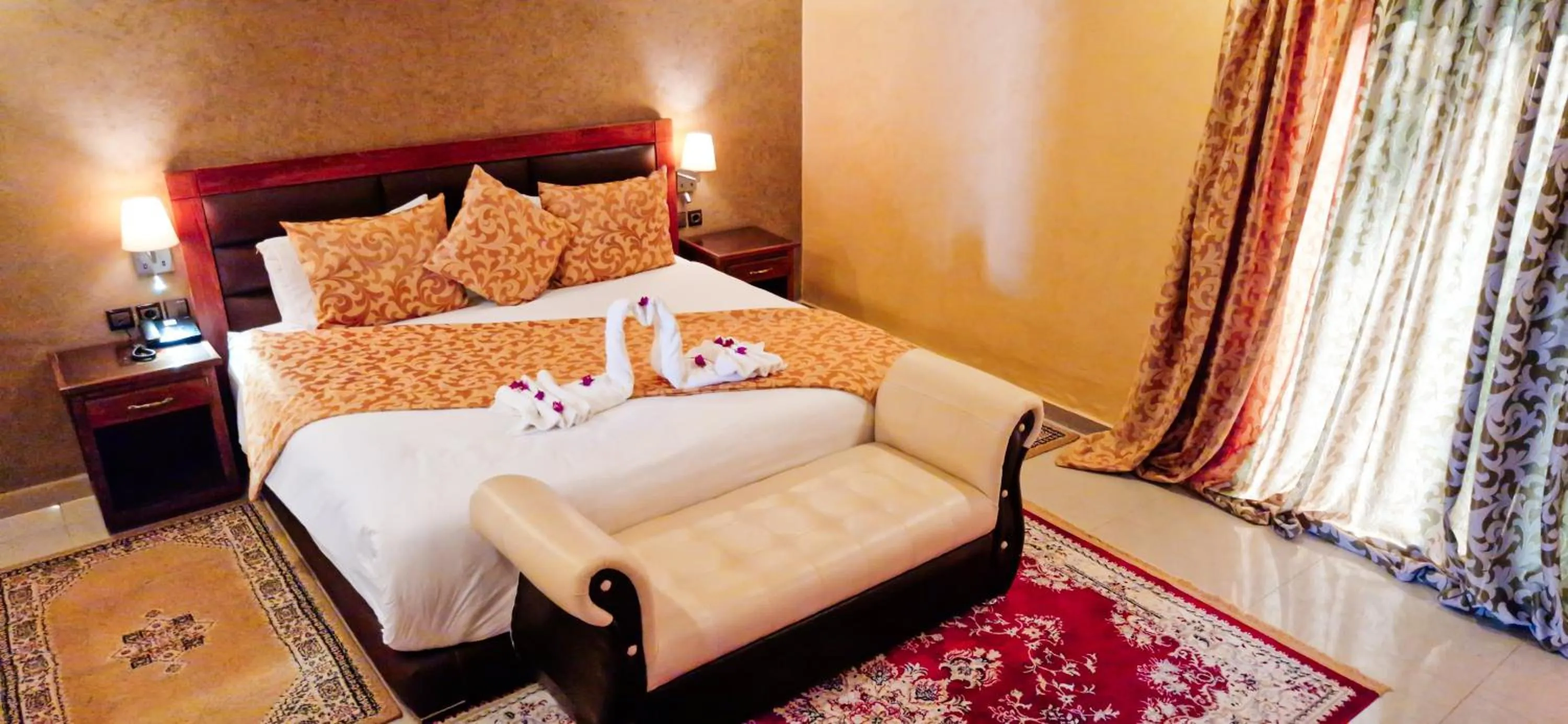 Bed in Palm's Hotel Club