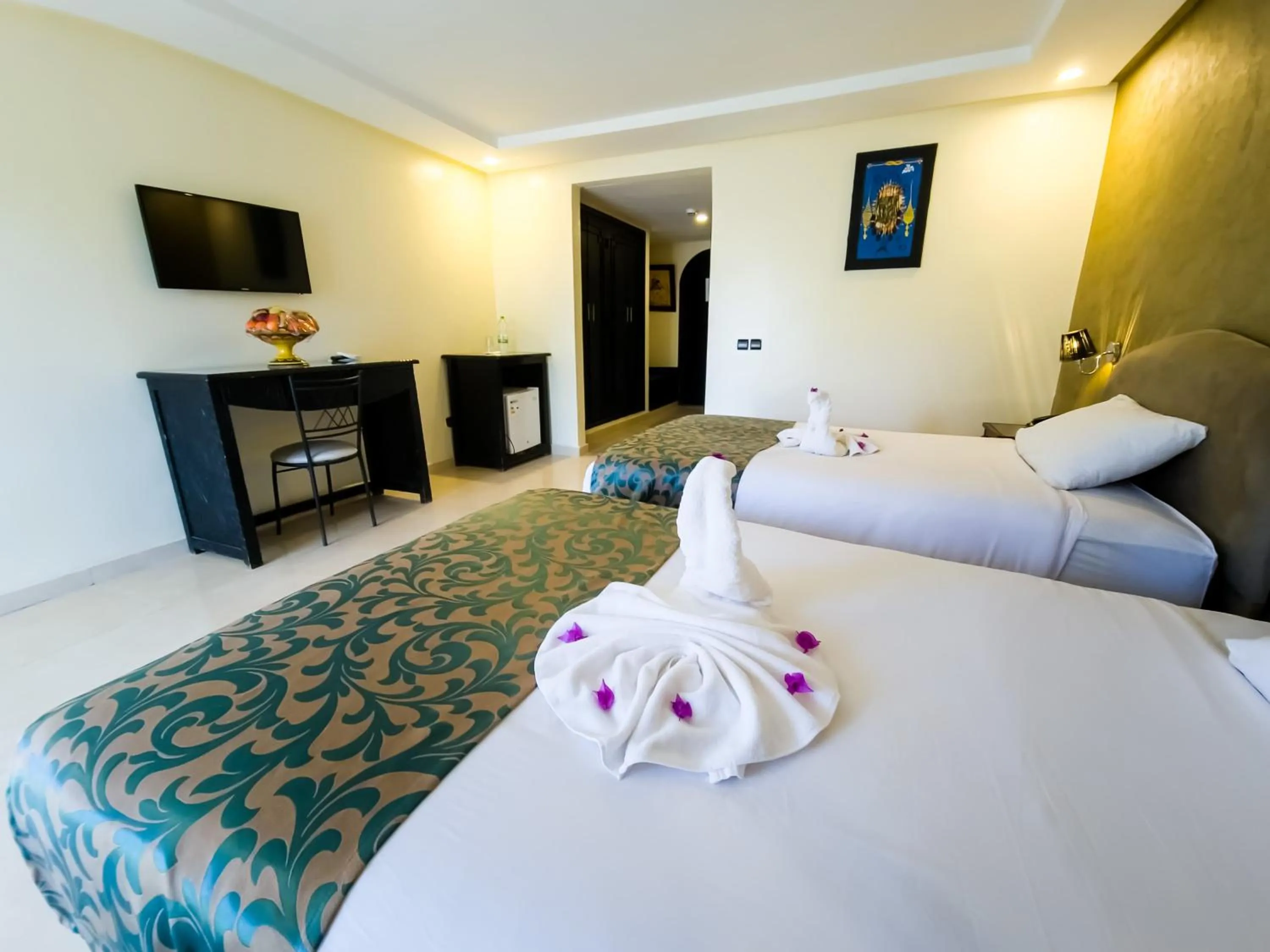 Bed in Palm's Hotel Club