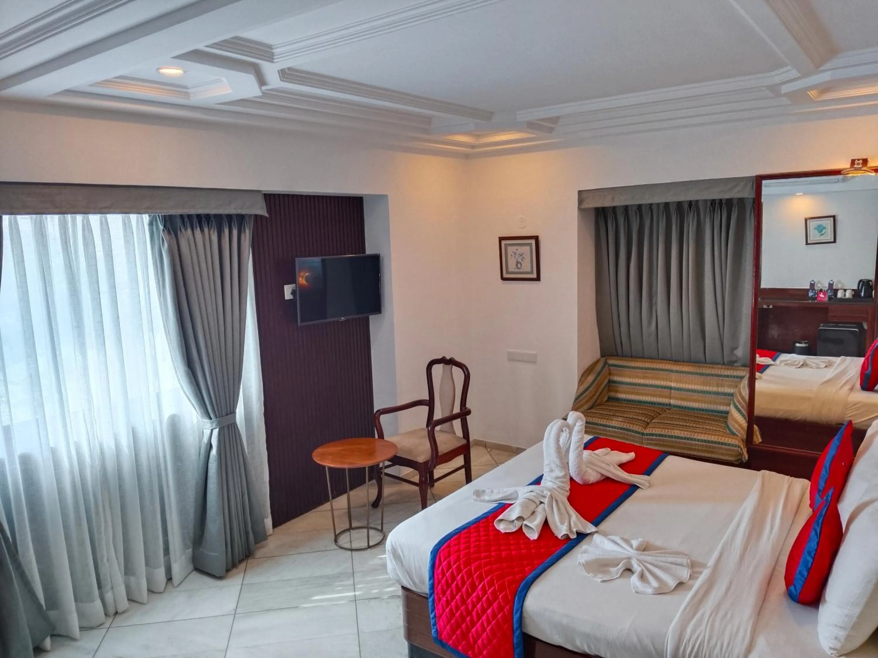 Bed in Spree Hotel Rajkot