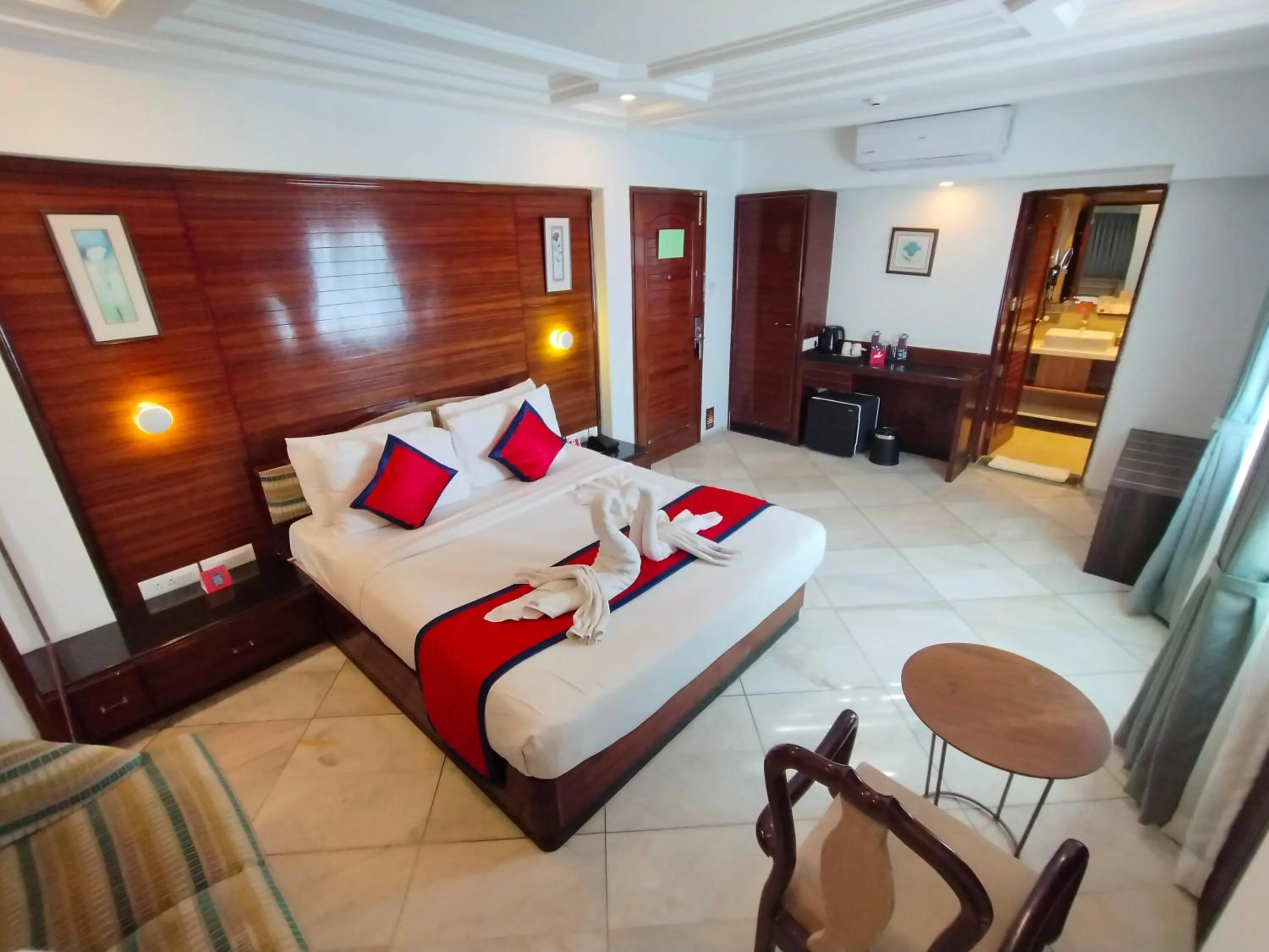 Photo of the whole room, Bed in Spree Hotel Rajkot