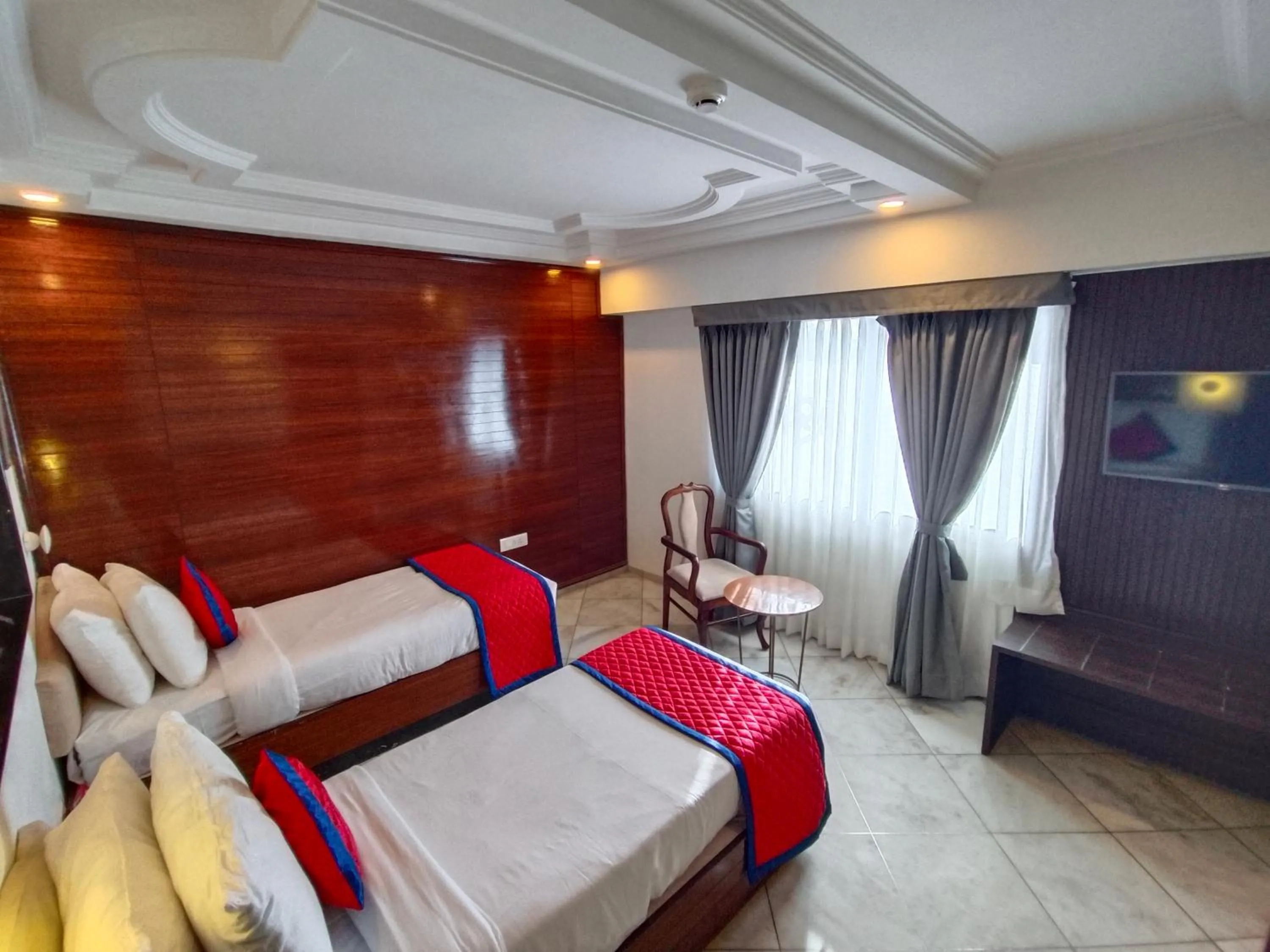 Photo of the whole room, Bed in Spree Hotel Rajkot