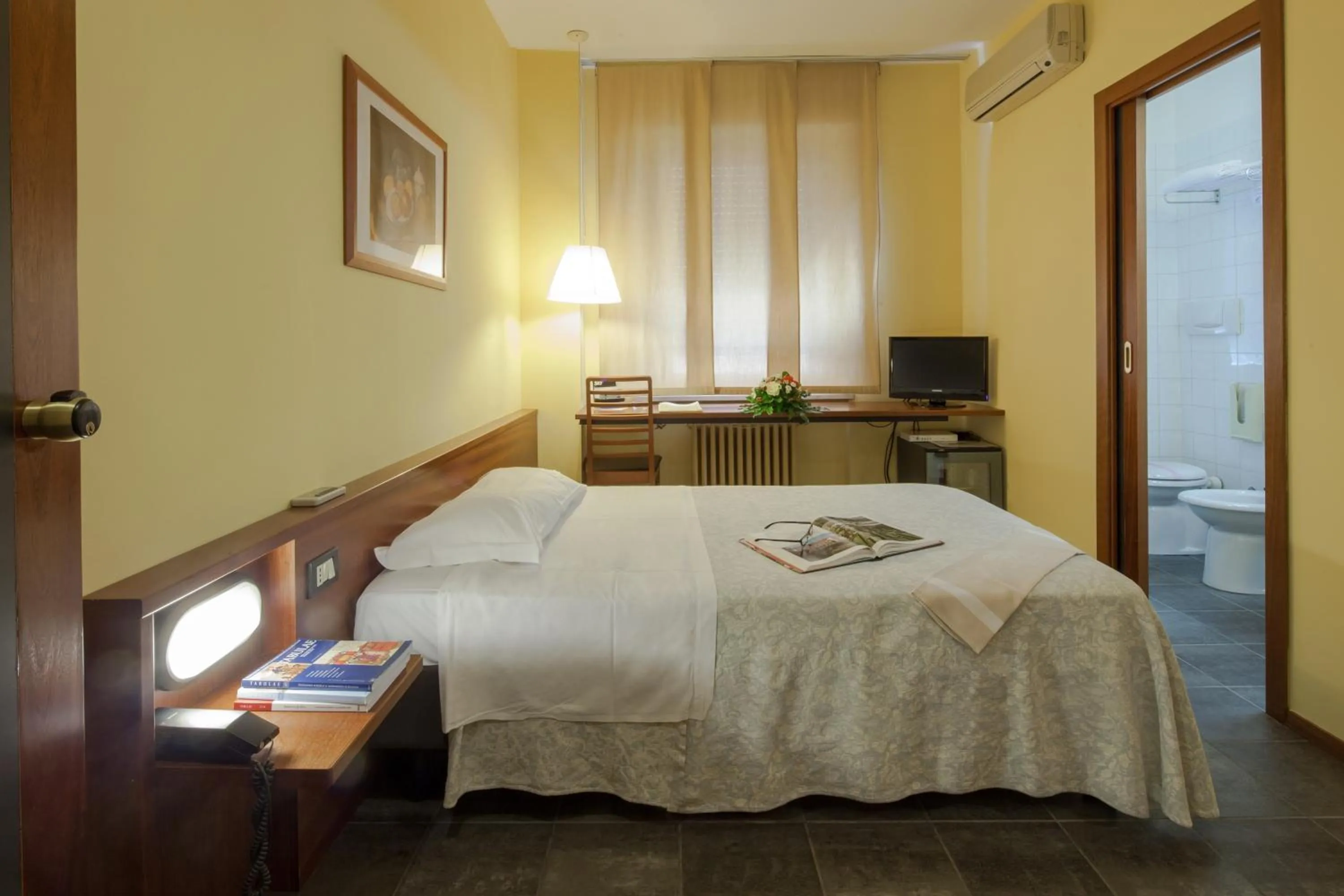 Bed in Hotel Mariani