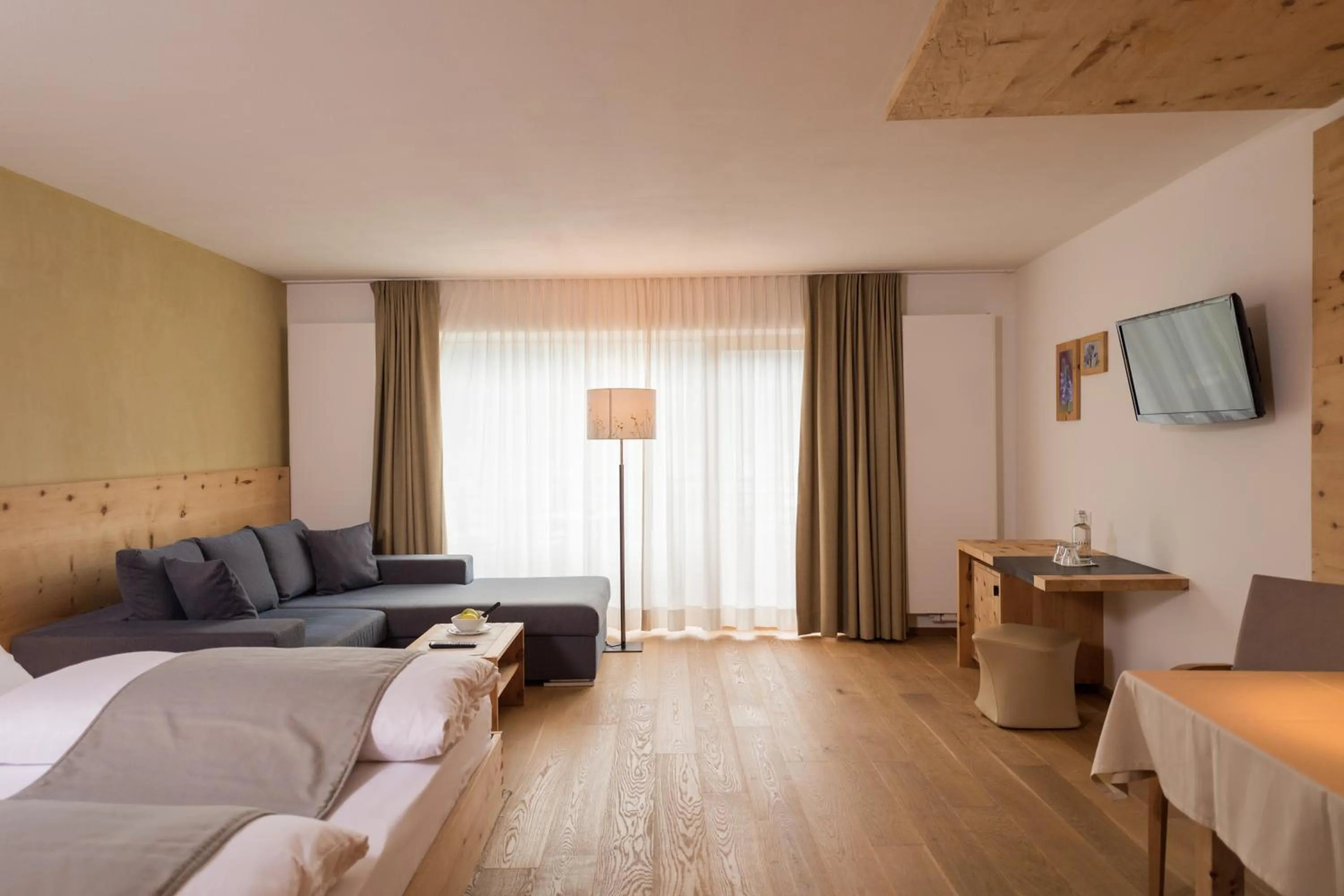 Photo of the whole room, Bed in Naturhotel Leitlhof