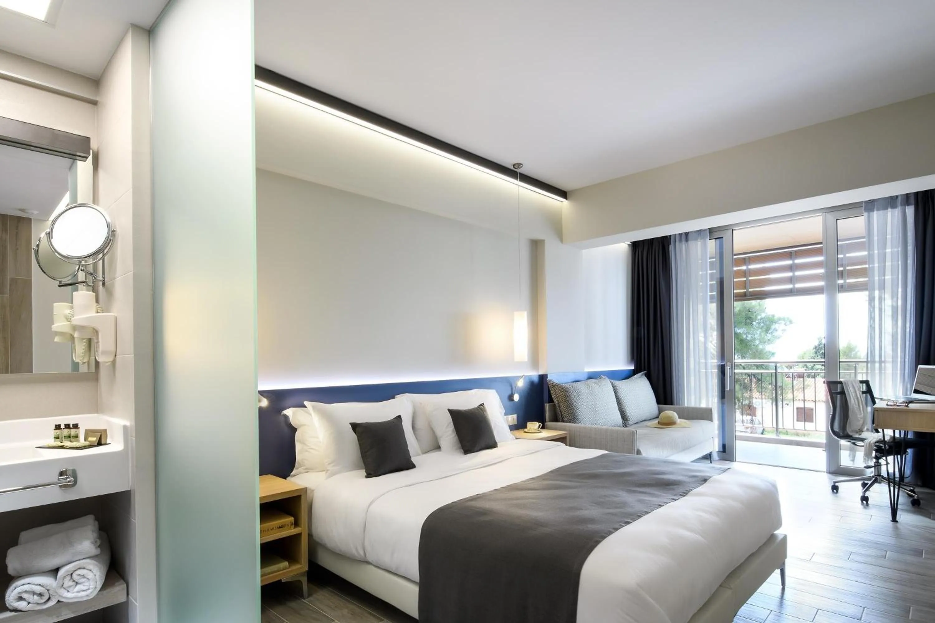 Photo of the whole room, Bed in Blue Dolphin Hotel