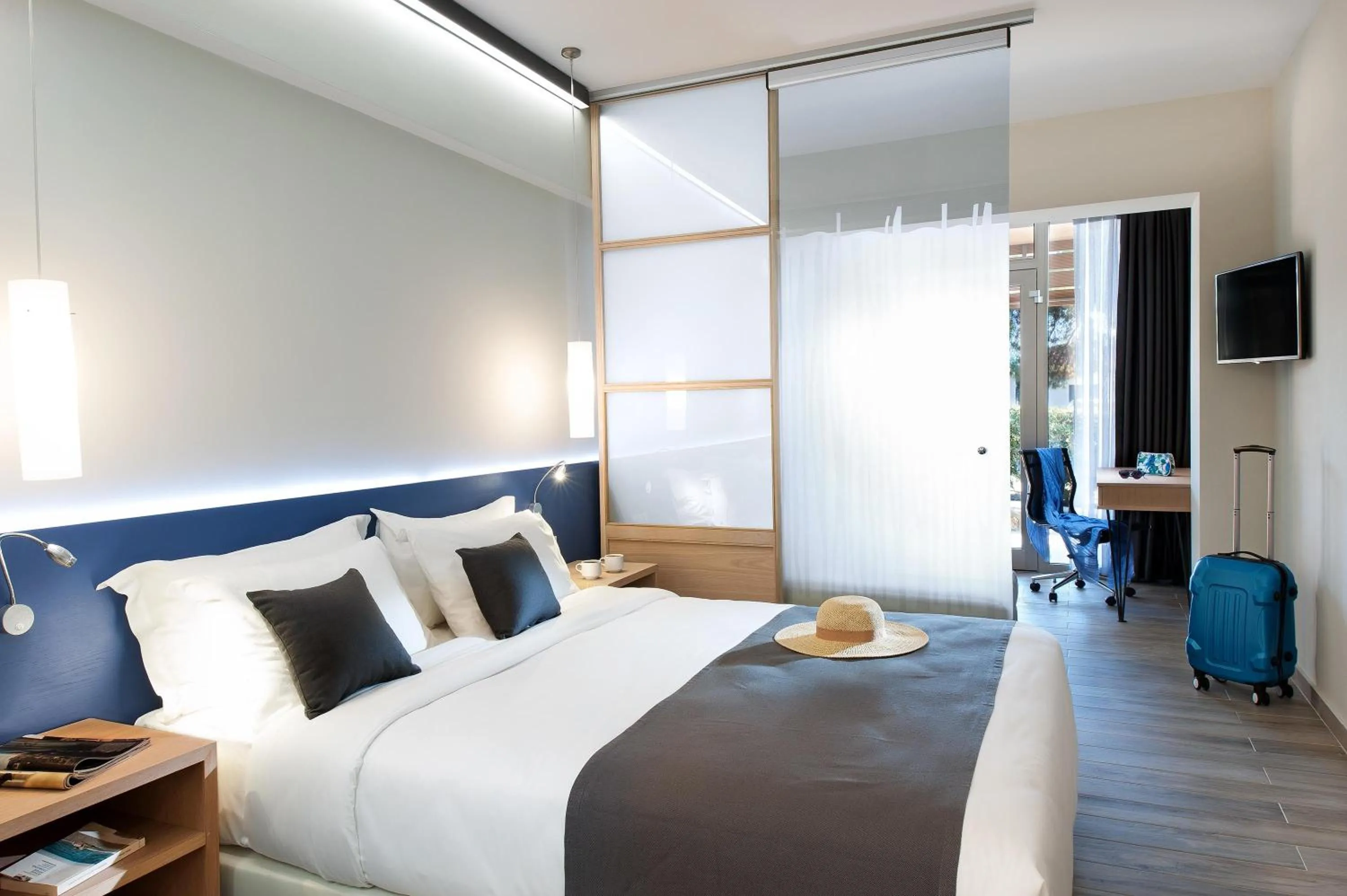 Photo of the whole room, Bed in Blue Dolphin Hotel