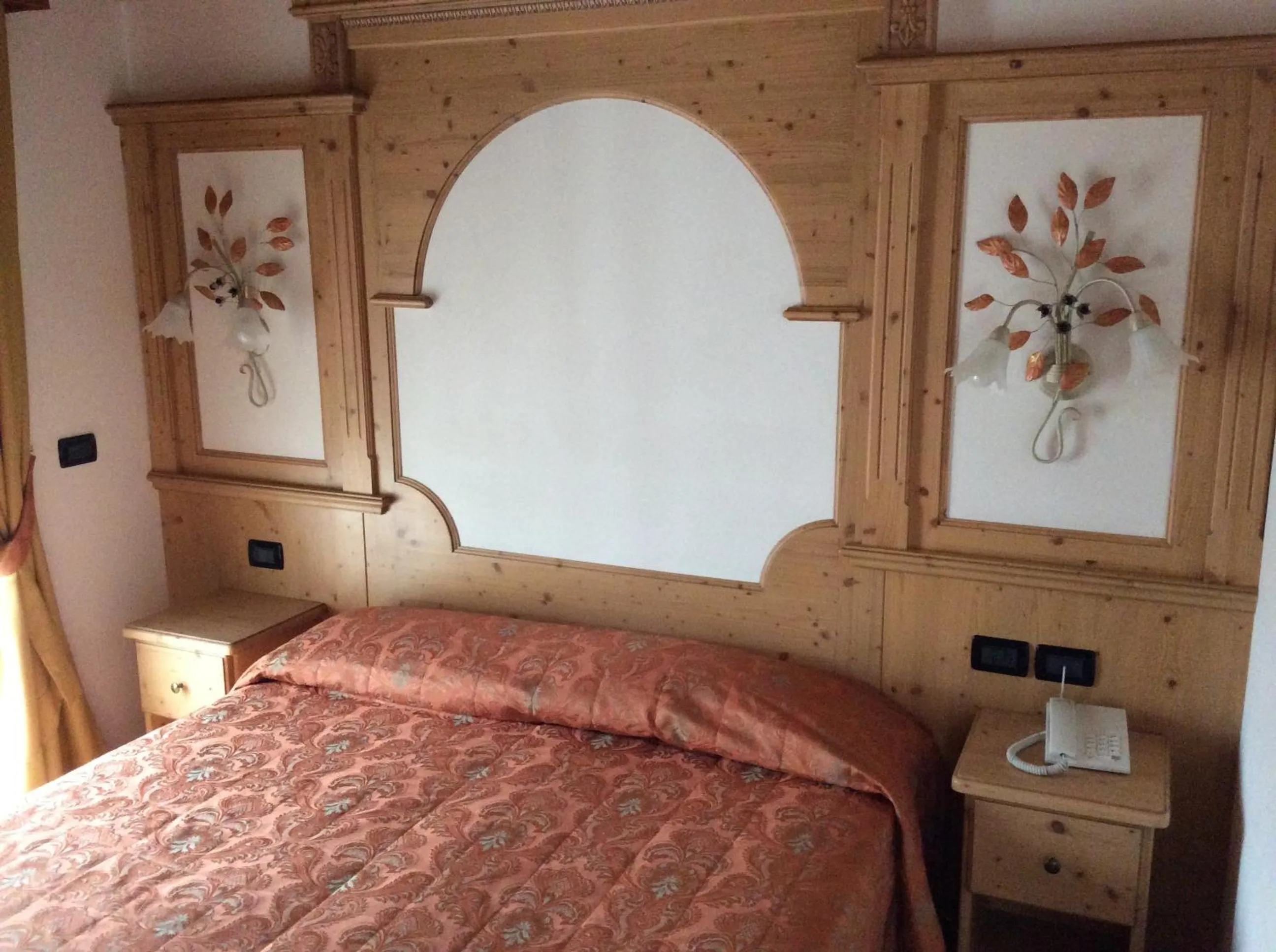 Decorative detail, Bed in Residence Garnì Il Giglio