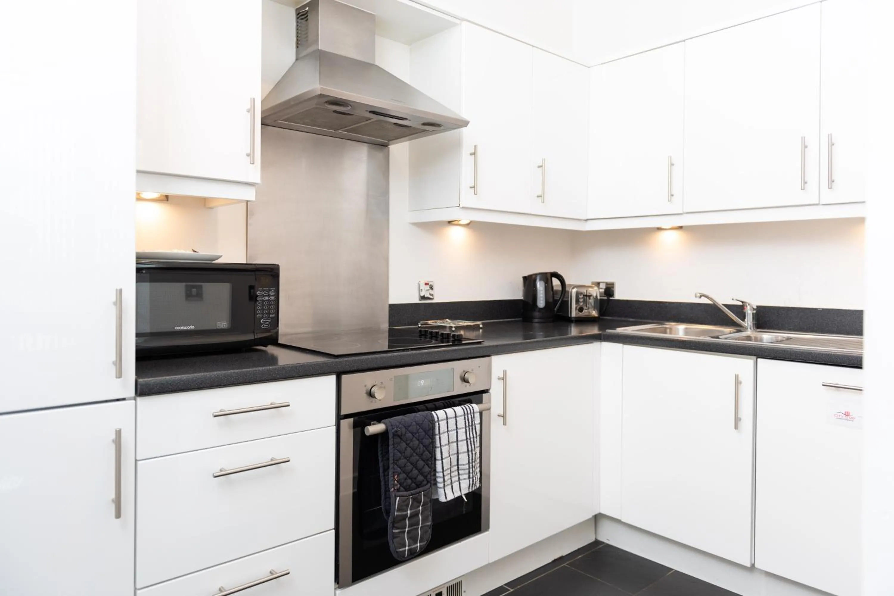 Kitchen or kitchenette in City Stay Apartments - Hub