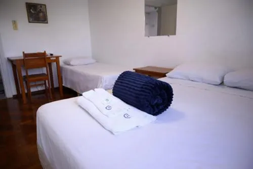 Bed in Central Plaza Hotel Tupa