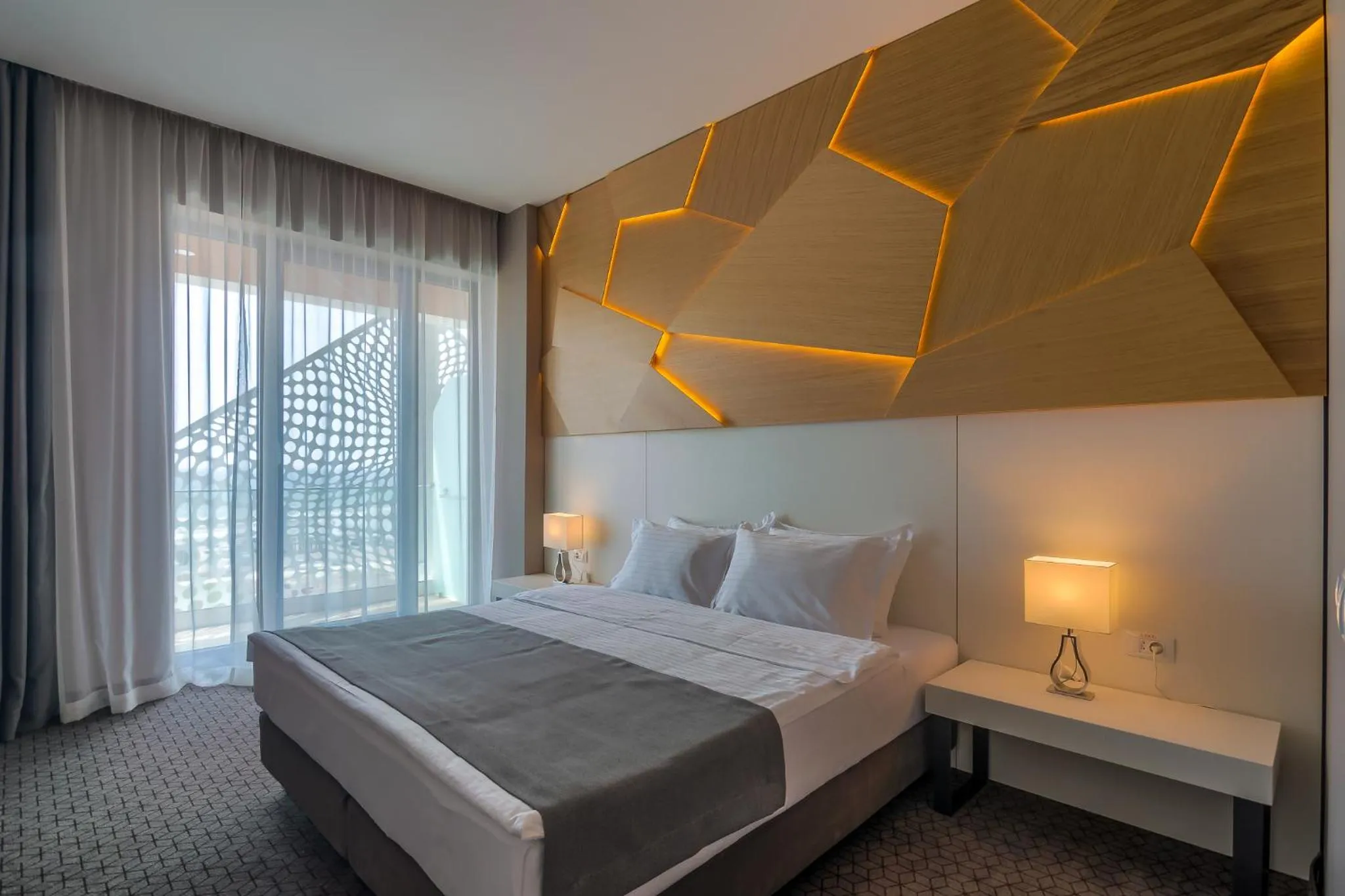 Bed in Nyota Hotel & Conference Center