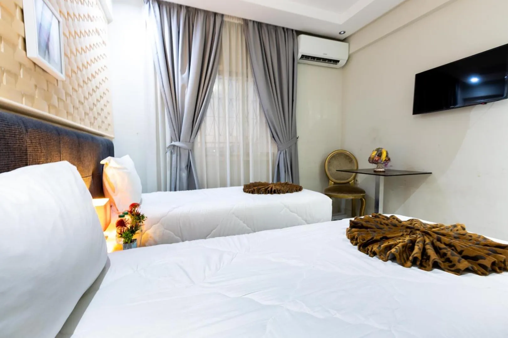 Bedroom in Hotel Hospitality-Inn City Center