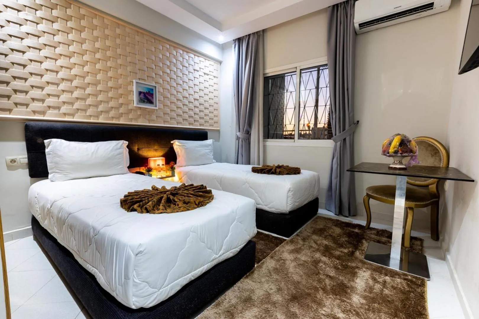 Bedroom in Hotel Hospitality-Inn City Center