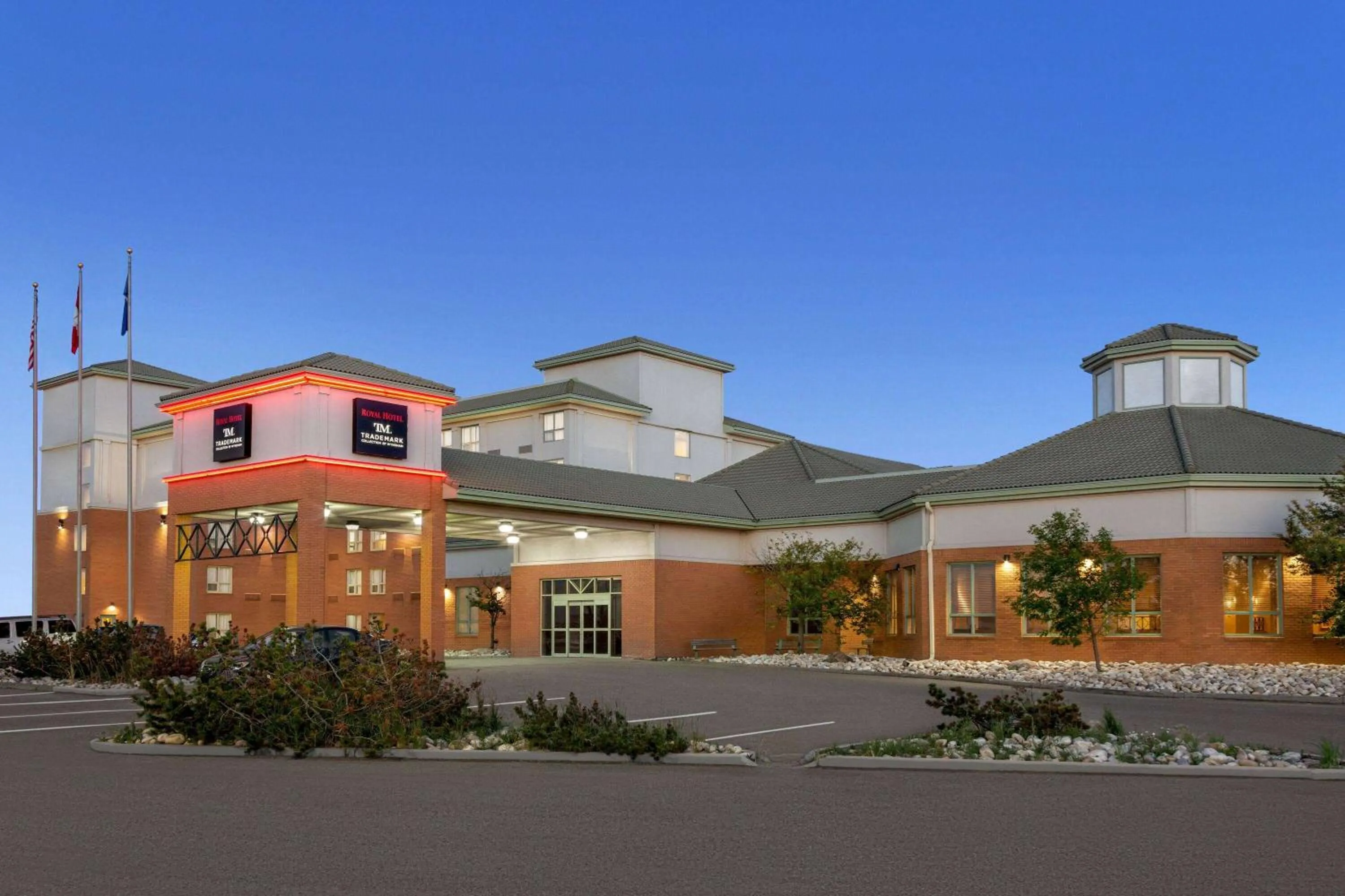 Property building in Royal Hotel Edmonton Airport Trademark Collection By Wyndham