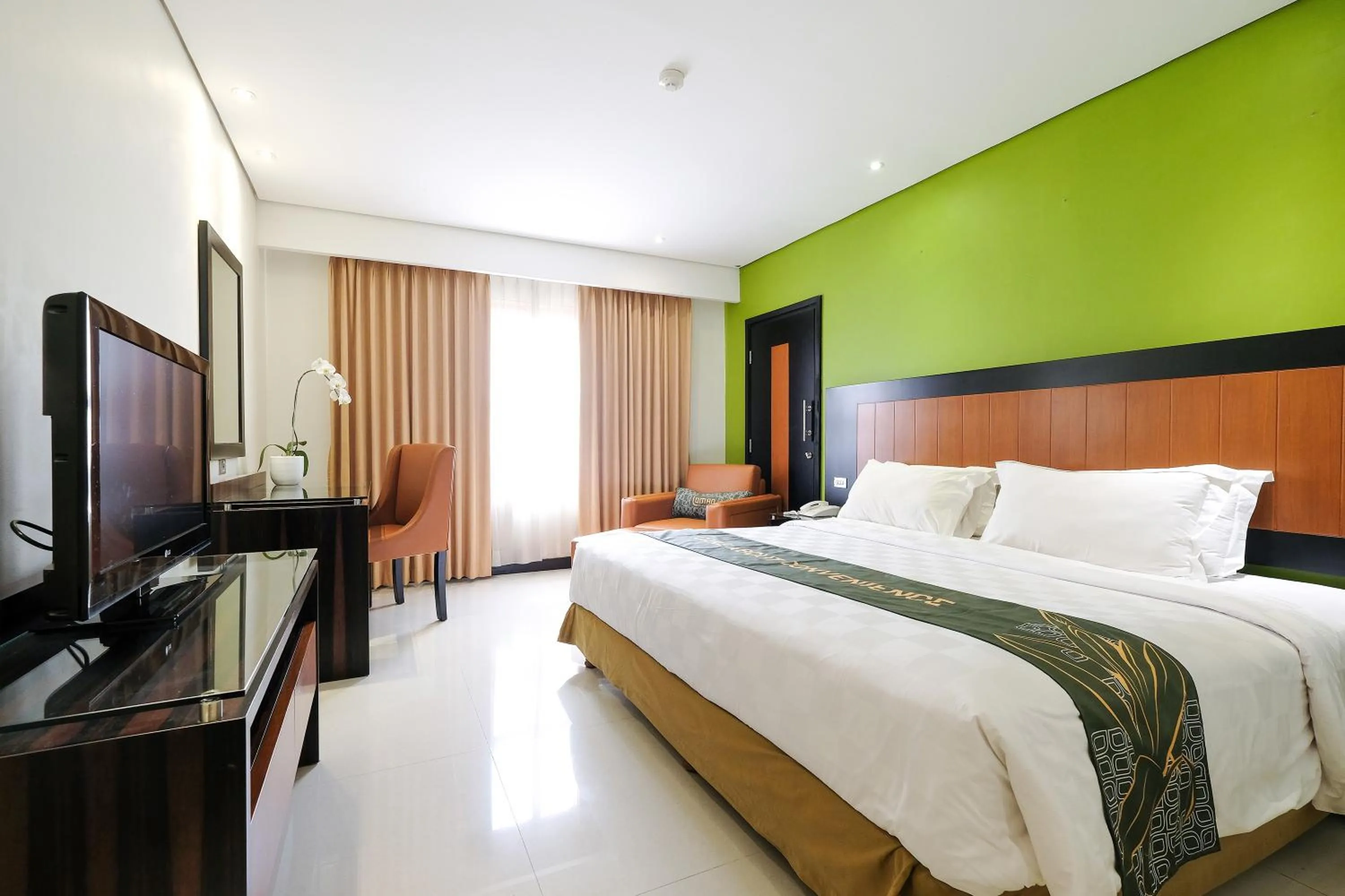 Bed in Loman Park Hotel Yogyakarta