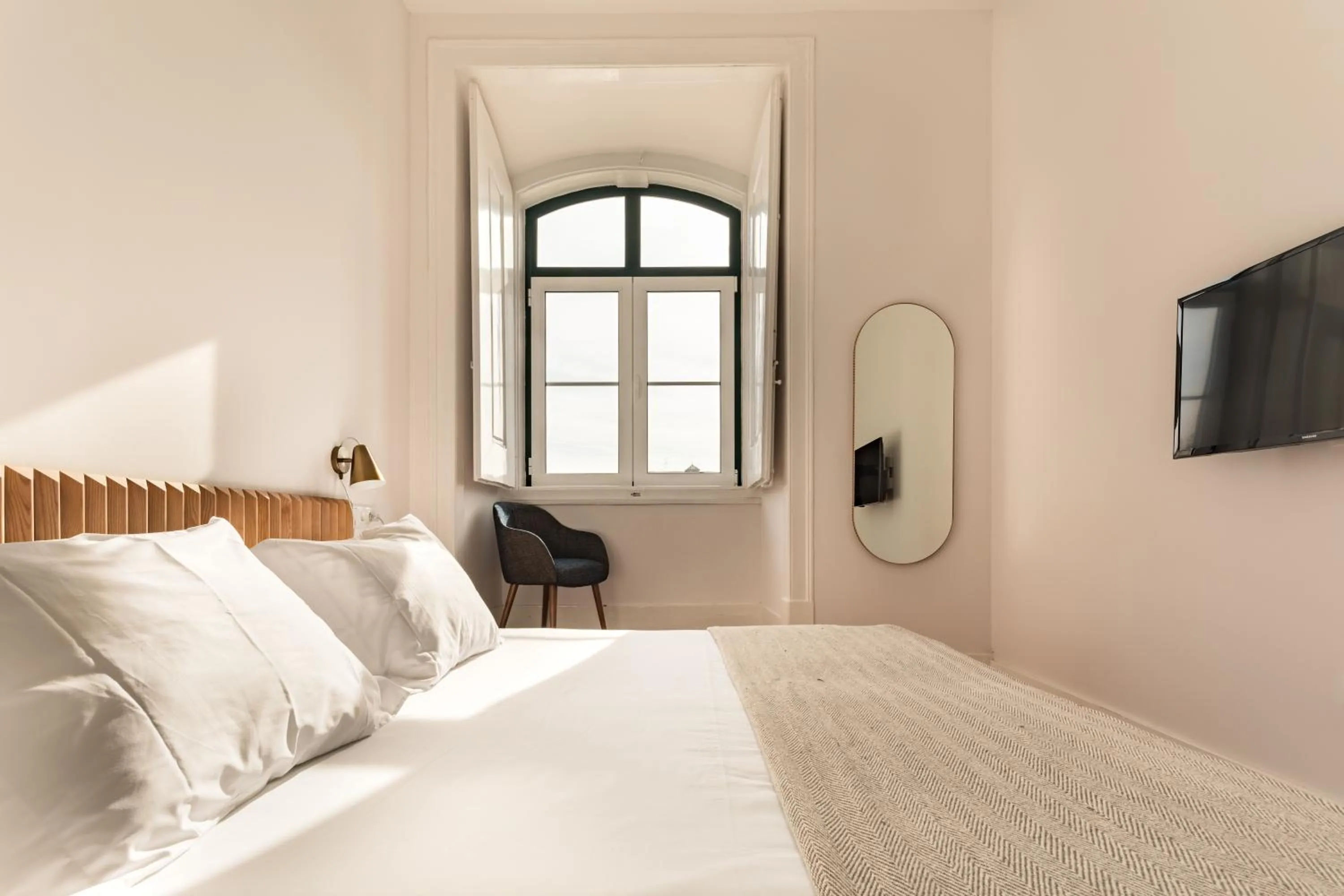 Bed in The Visionaire Apartments