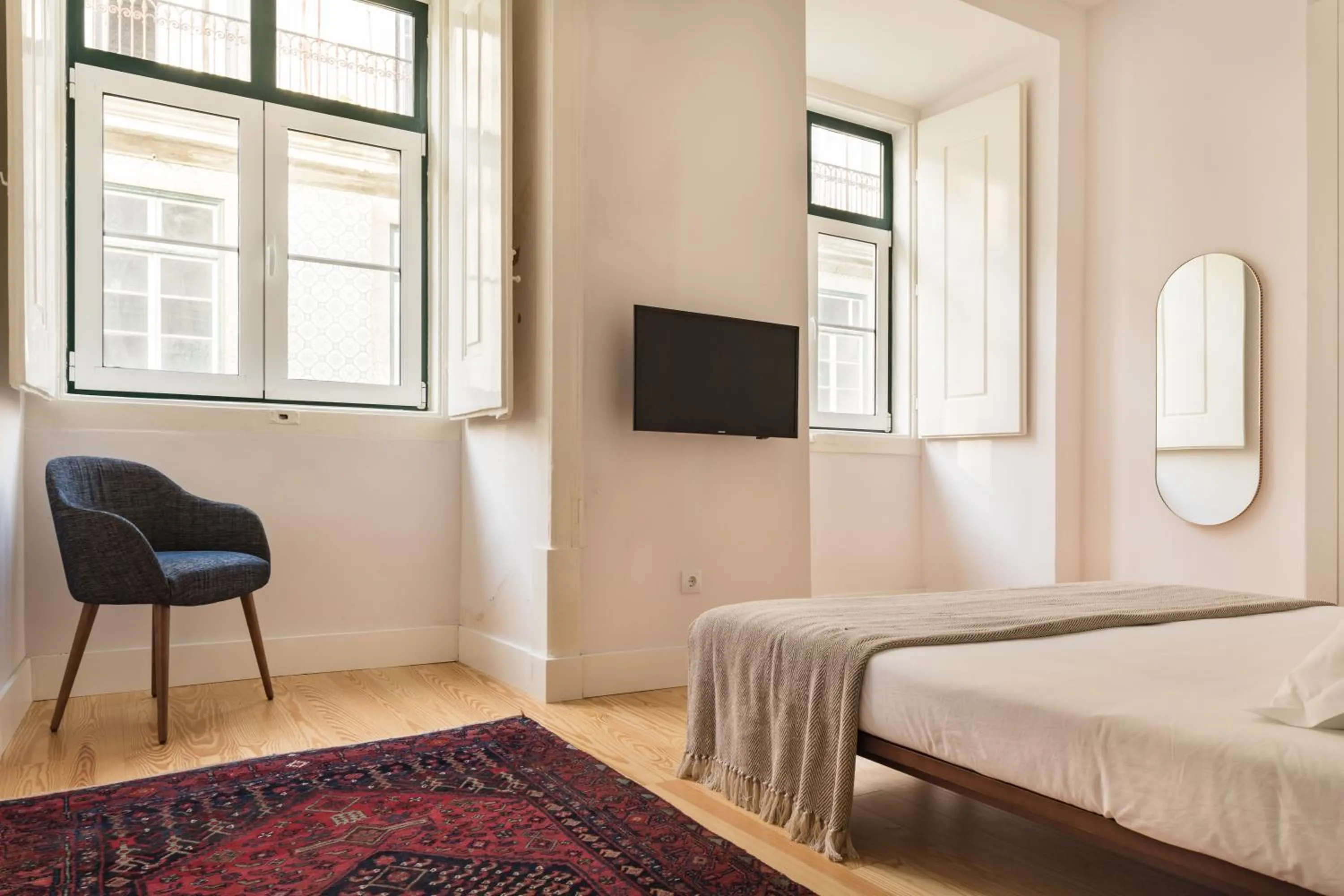 Bed in The Visionaire Apartments