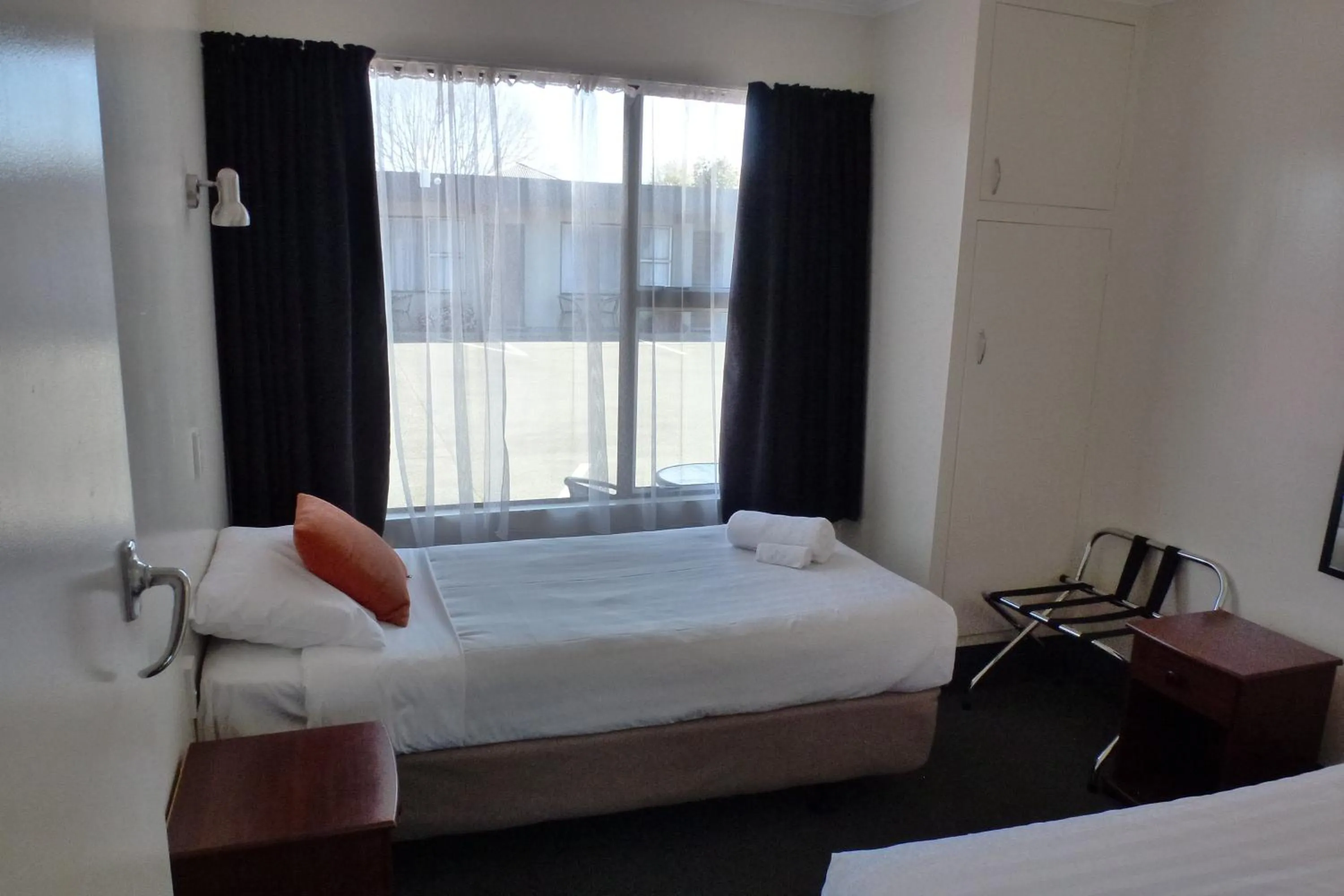 Bed in ASURE Adcroft Motel