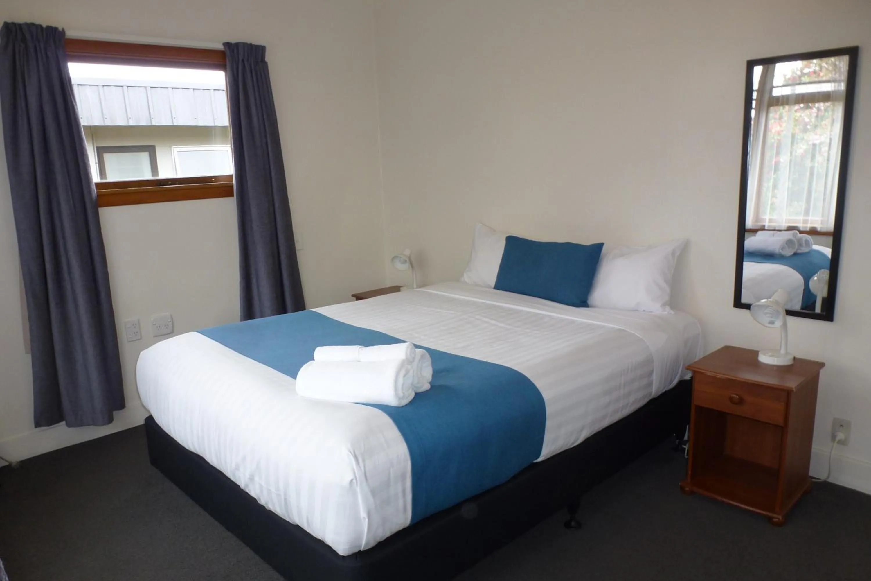 Bed in ASURE Adcroft Motel