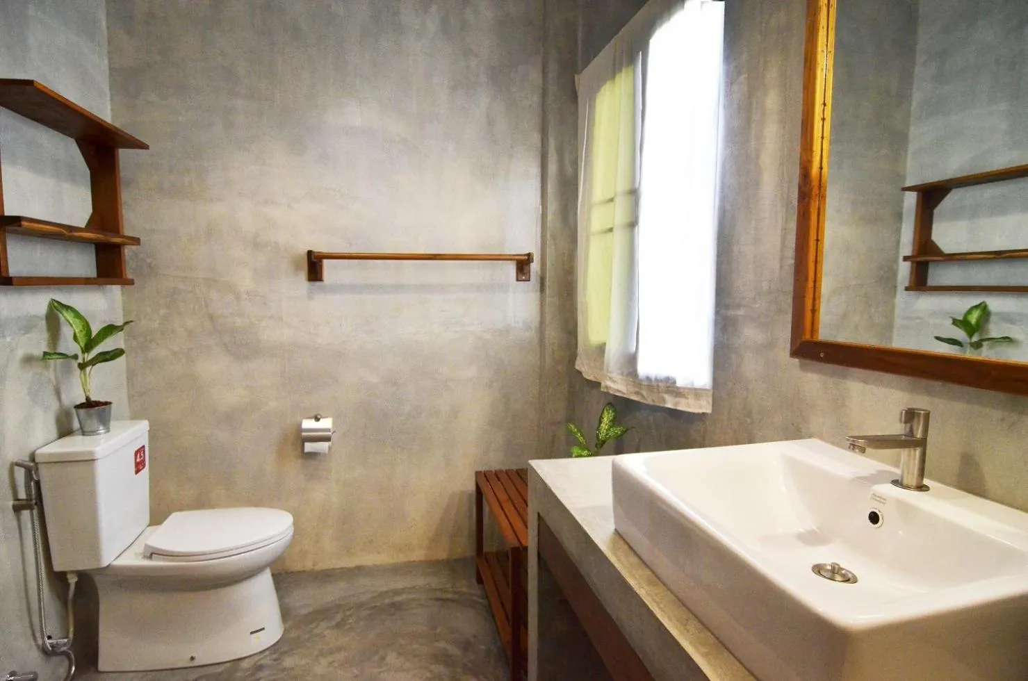 Toilet in Le Cocotier