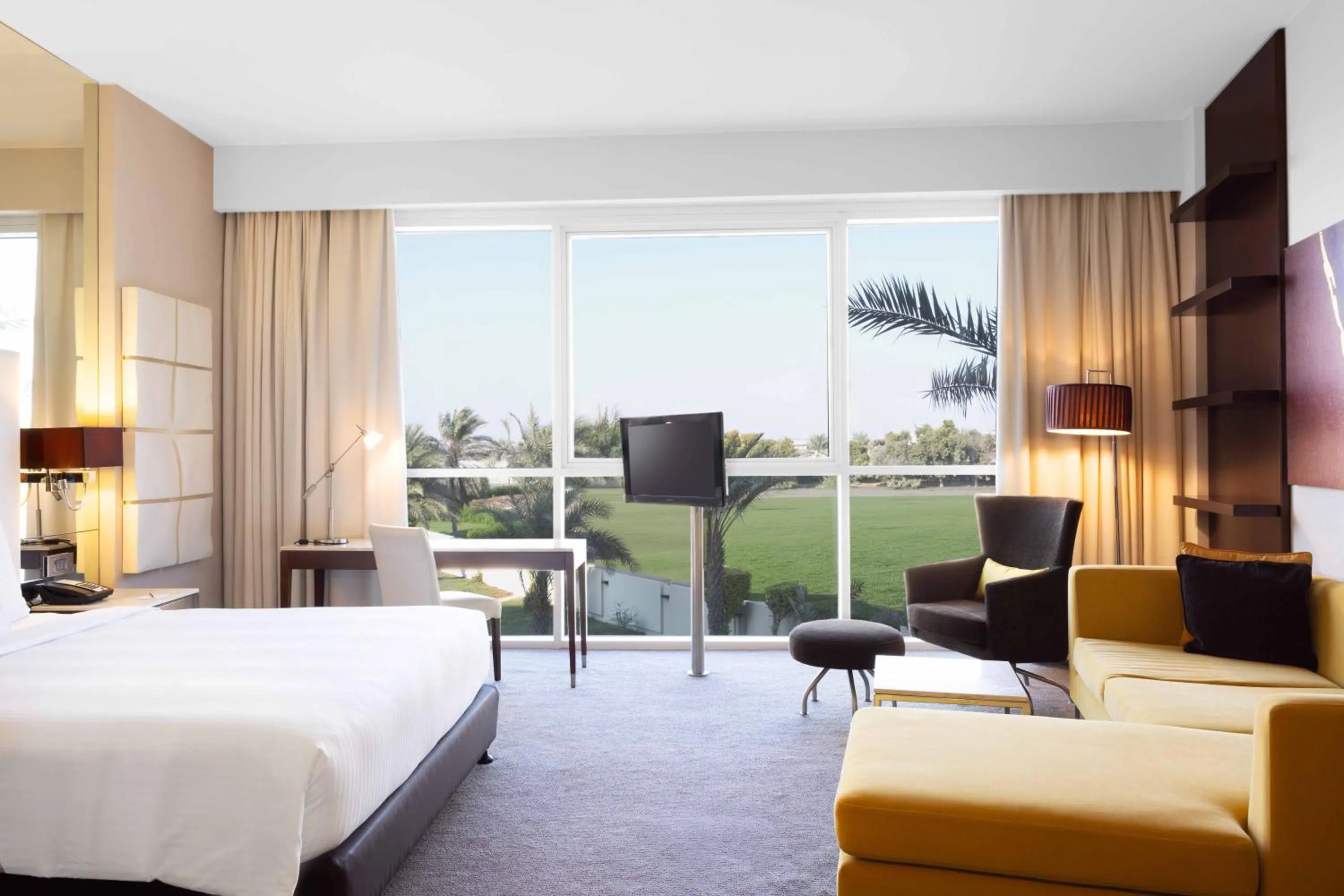 Living room, Bed in Centro Sharjah