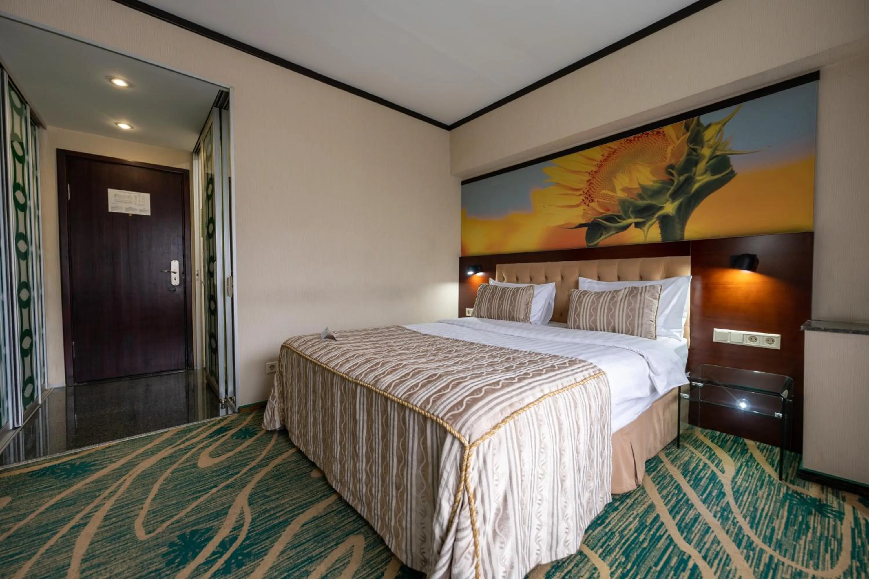 Bed in Hotel Kazzhol Almaty