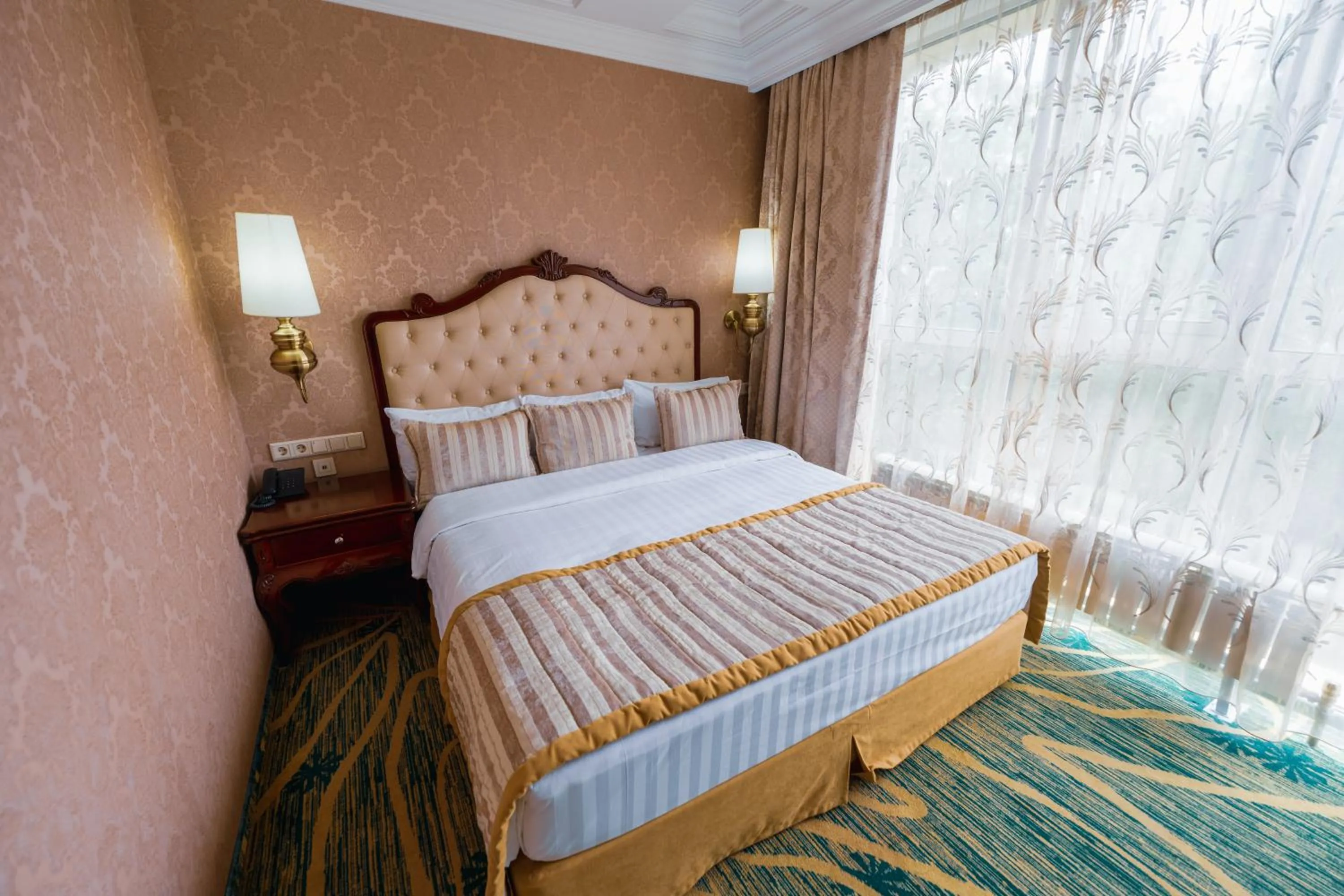 Bed in Hotel Kazzhol Almaty