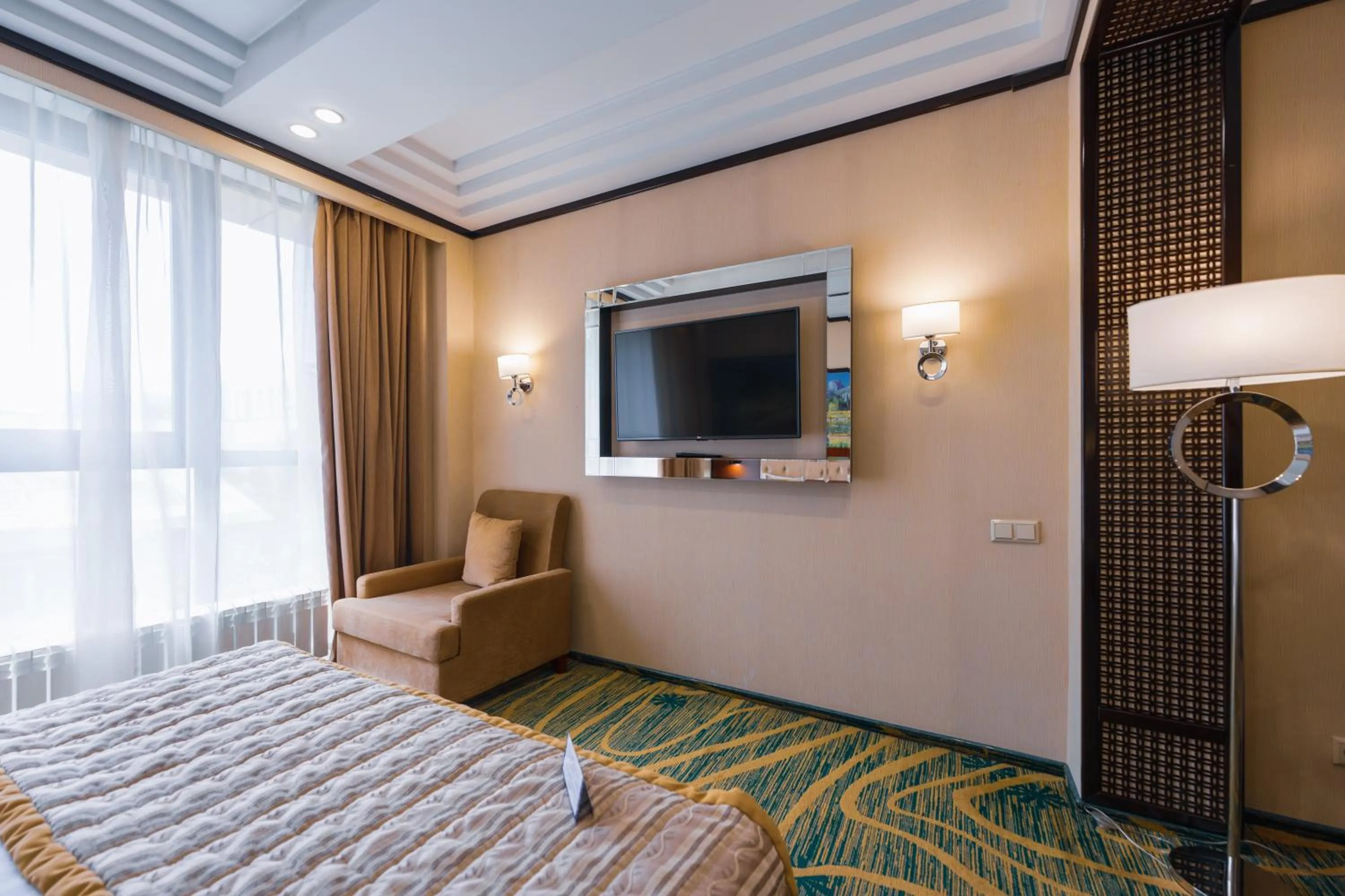 Bed in Hotel Kazzhol Almaty