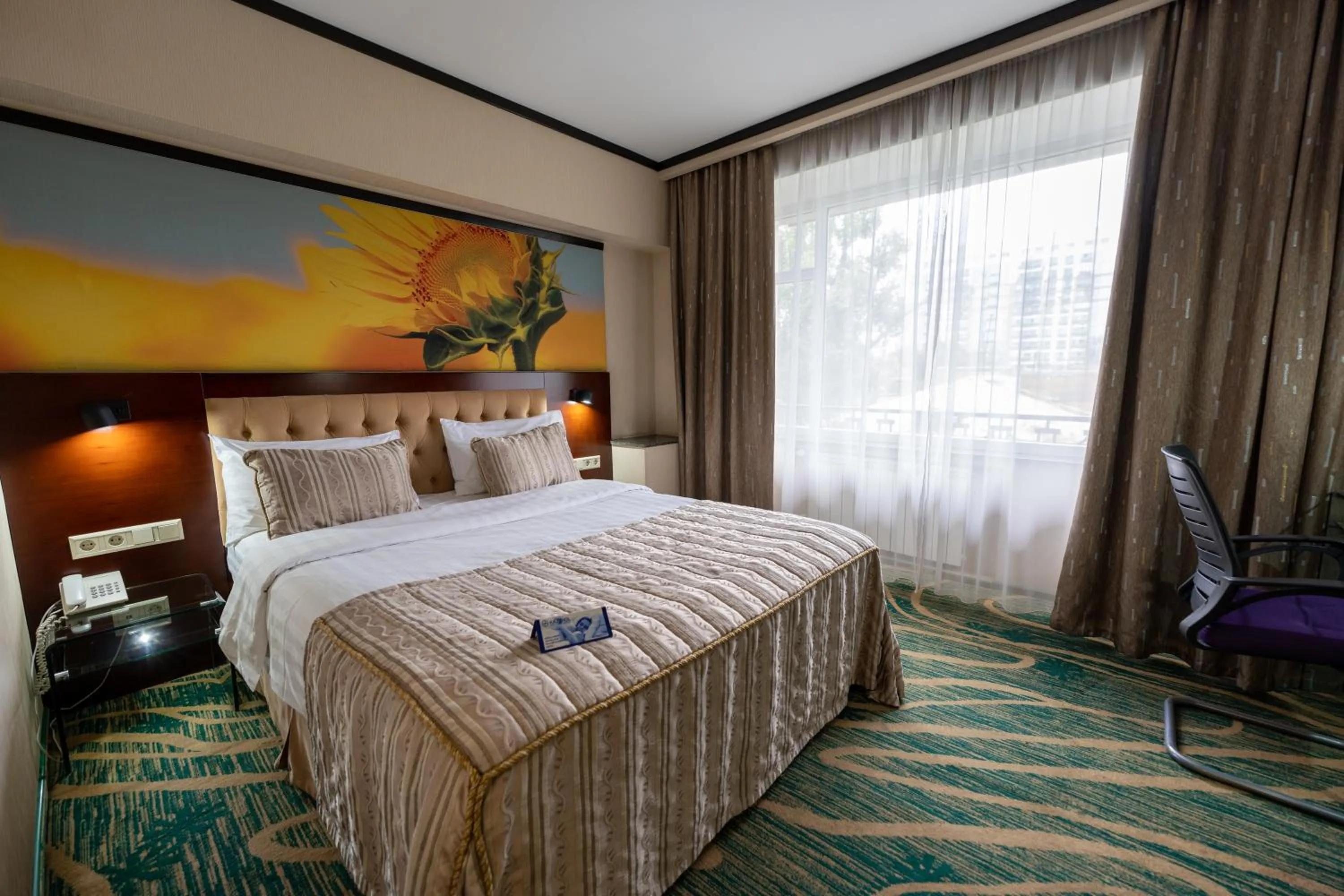 Bed in Hotel Kazzhol Almaty