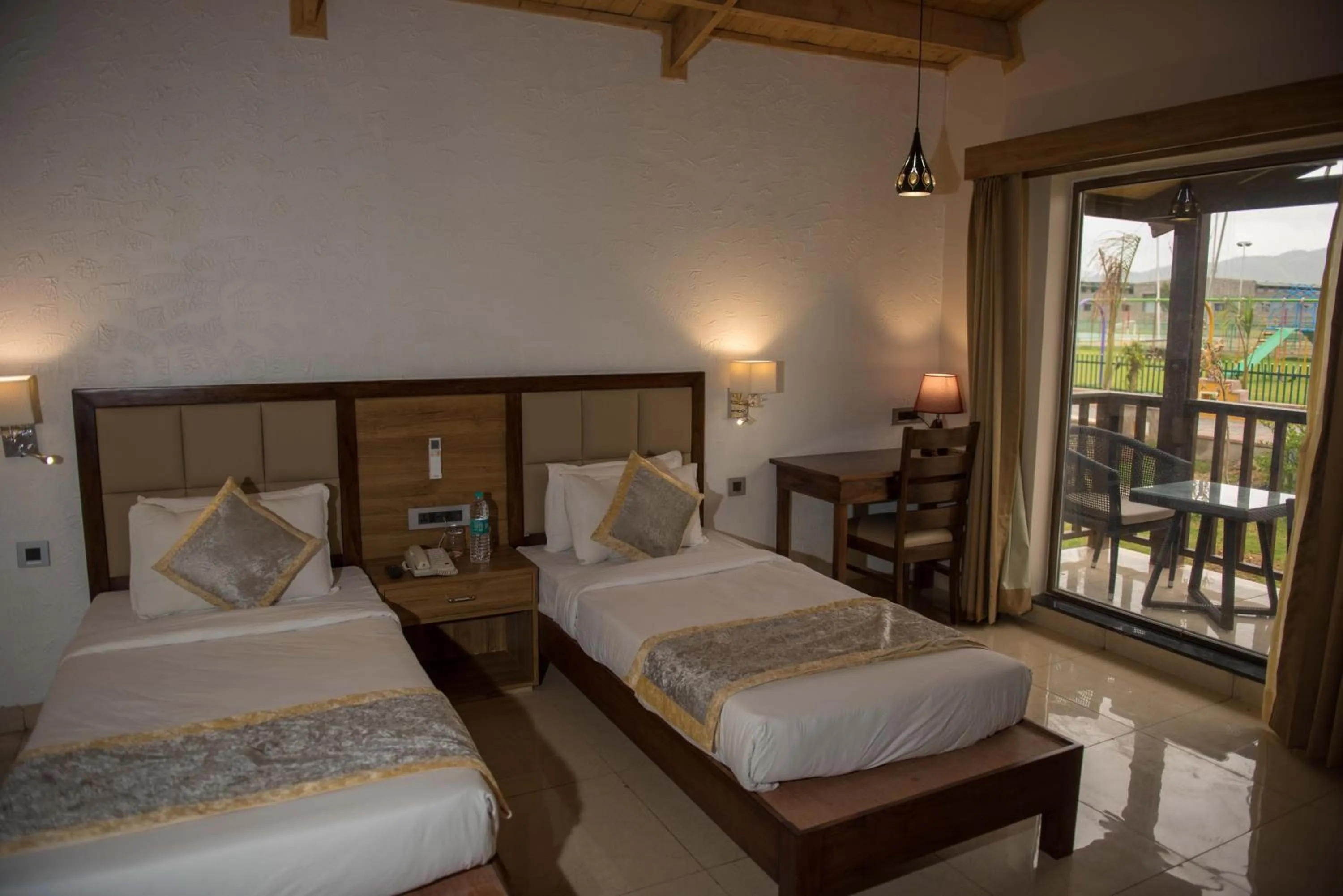 Bed in Sun Hotel and Resort, Mount Abu