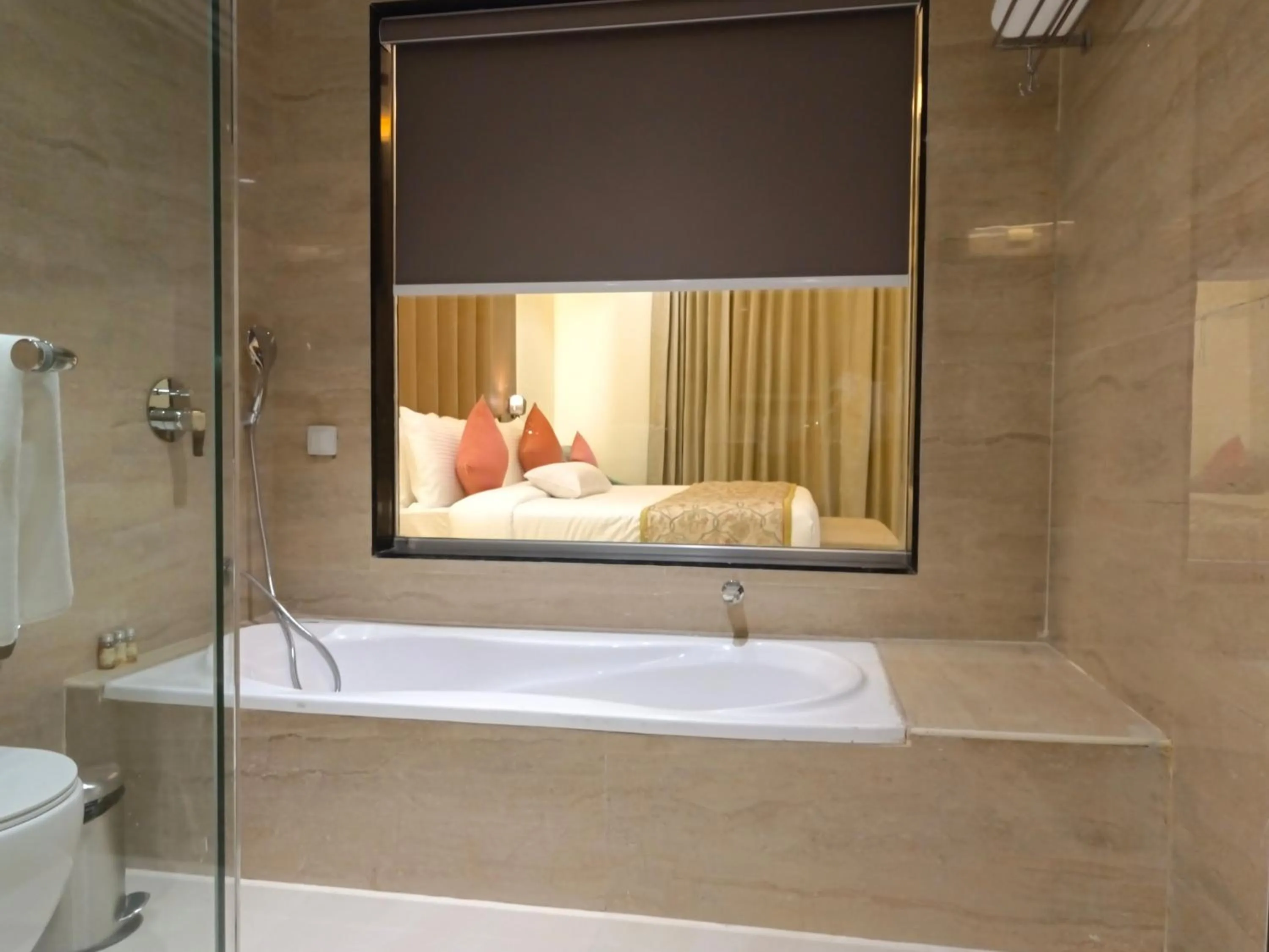 Bathroom, Bed in Sun Hotel and Resort, Mount Abu