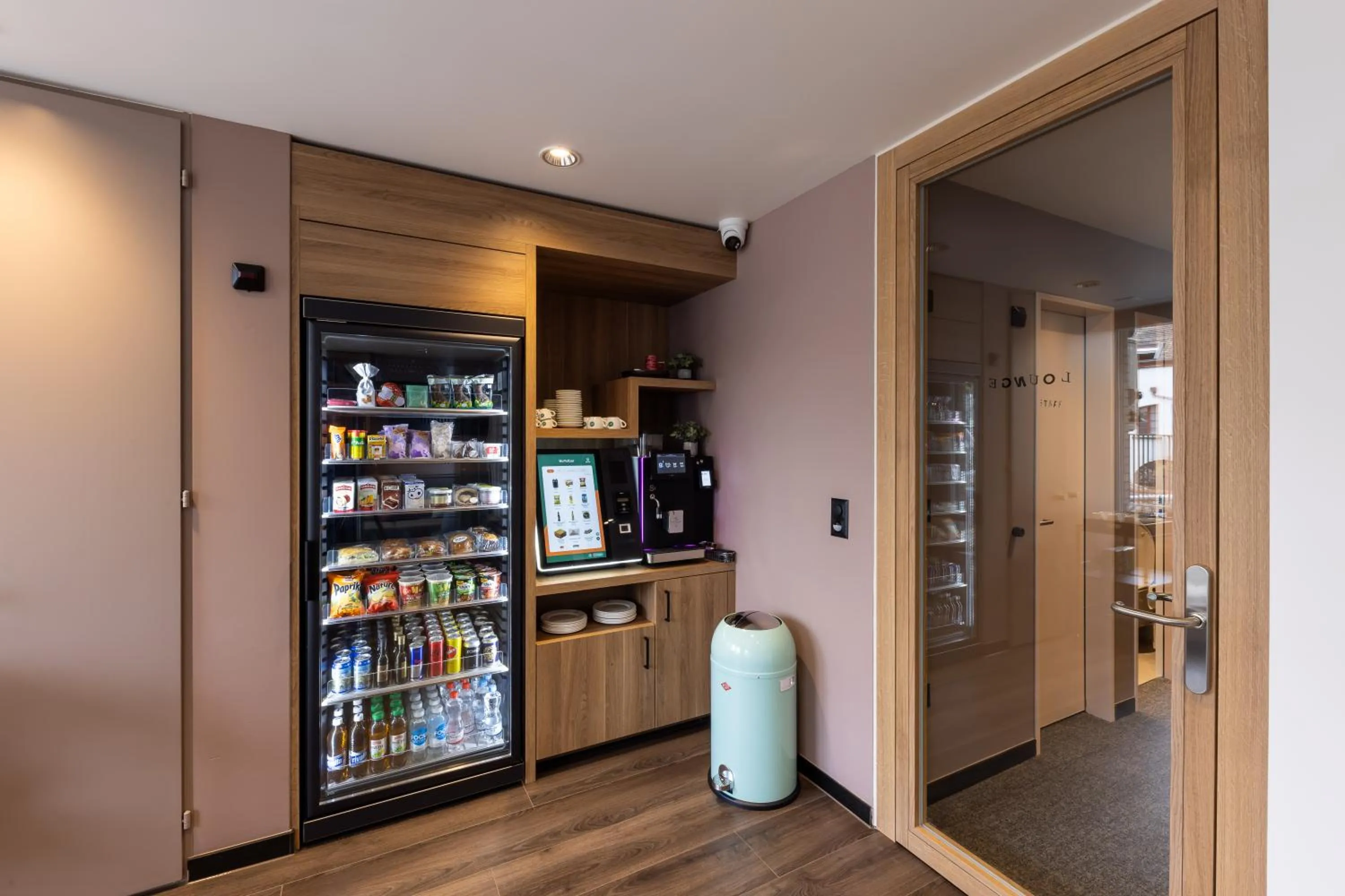 Communal lounge/ TV room in Hotel Loge