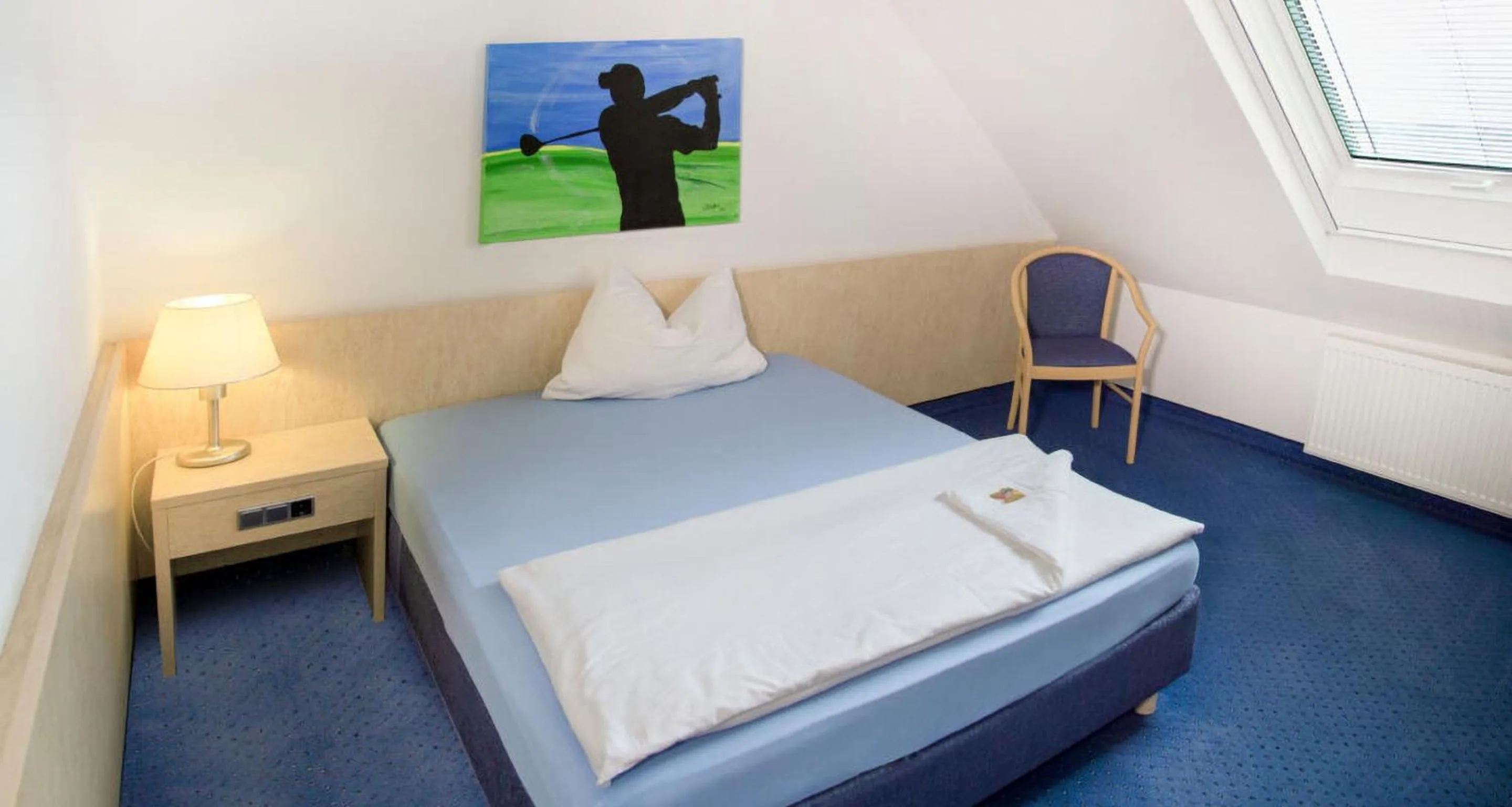 Bed in Fairway Hotel