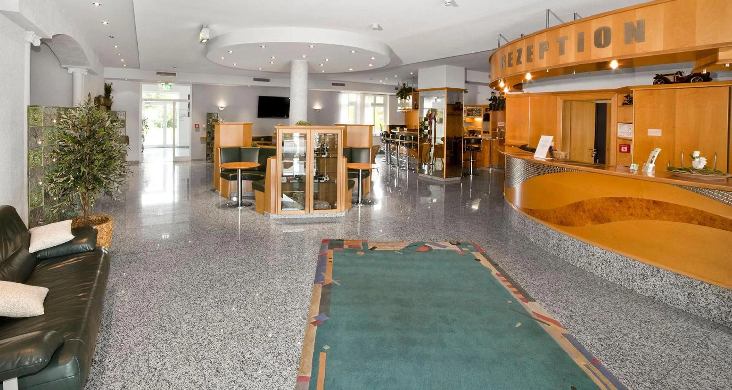 Lobby or reception in Fairway Hotel