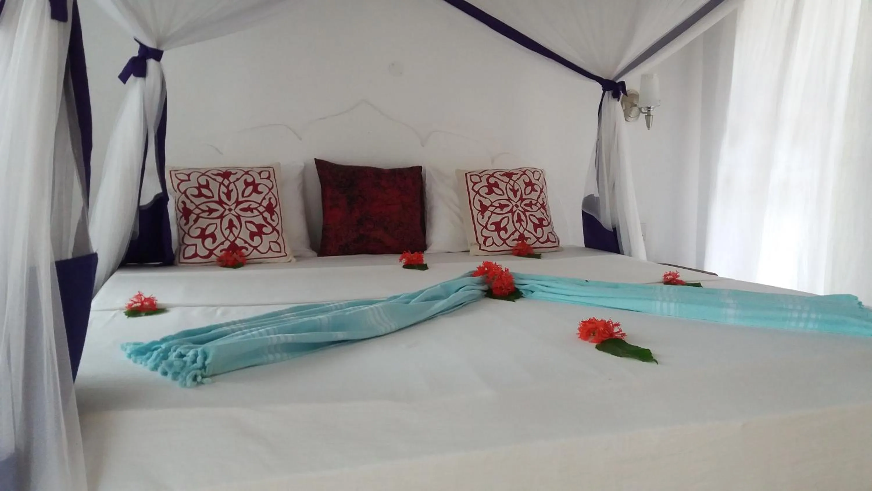 Bed in Laguna Palace Zanzibar