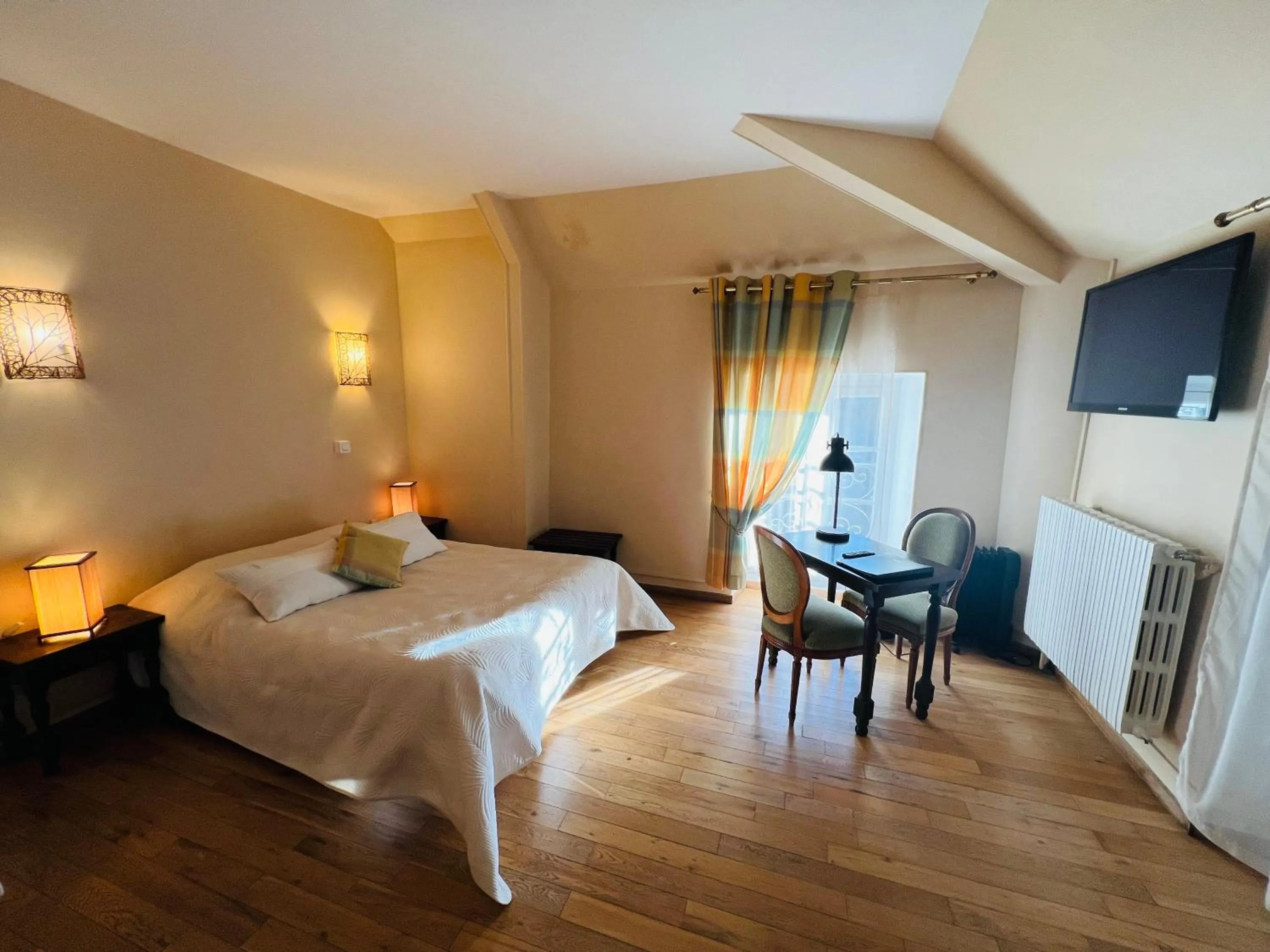 Bedroom in Hôtellerie Nouvelle de Villemartin