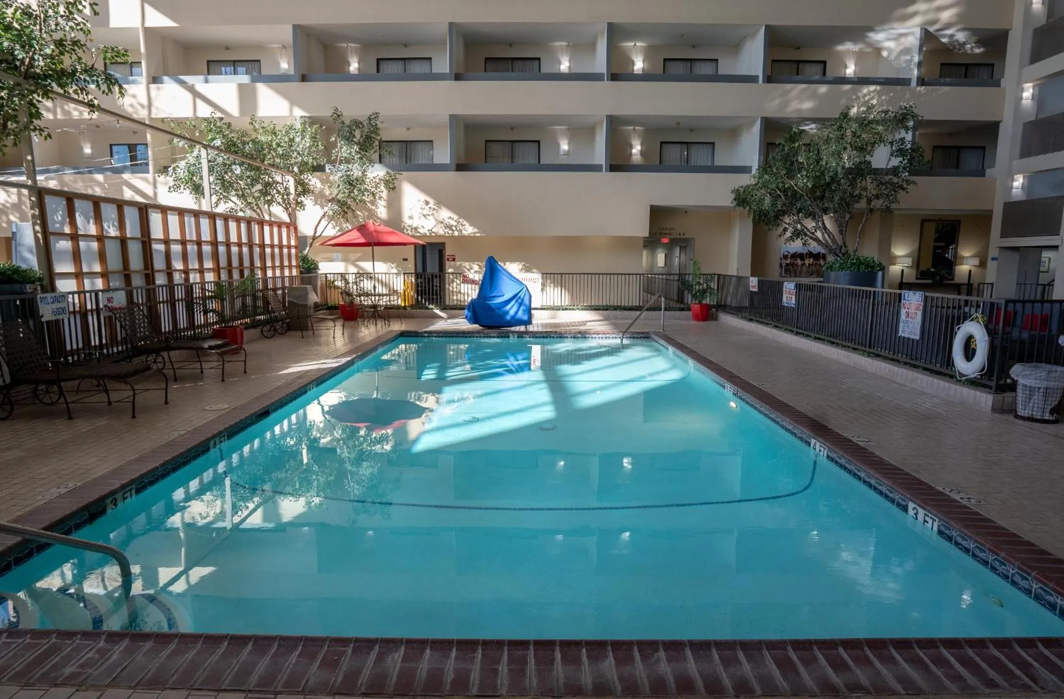 Swimming pool in Atrium Hotel and Suites DFW Airport