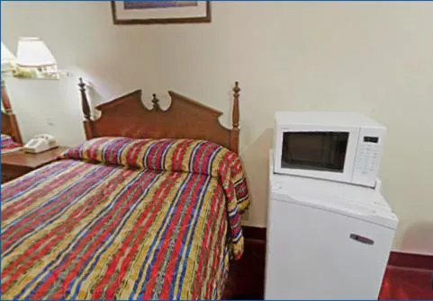 Photo of the whole room, Bed in Rumford Motor Inn