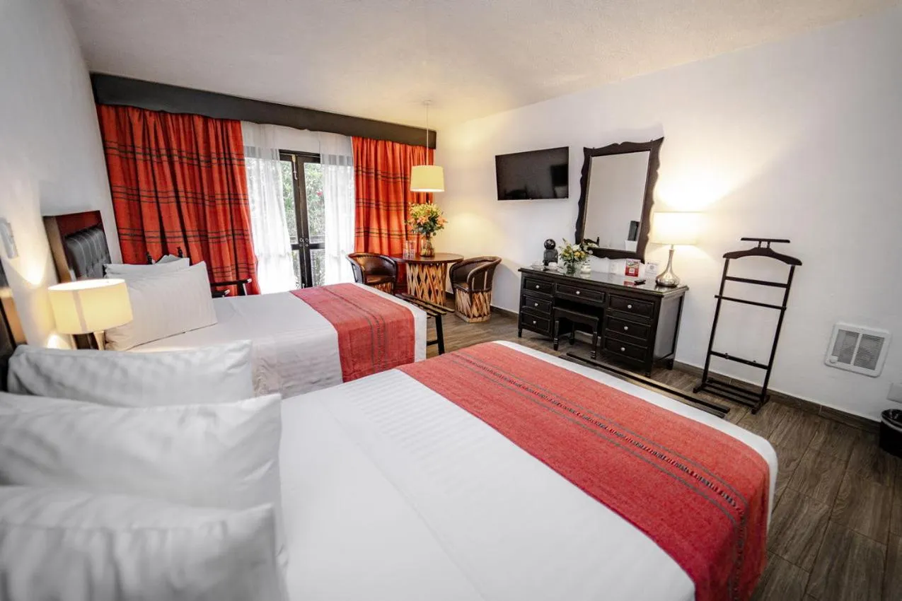 Bed in Best Western Plus Posada de Don Vasco