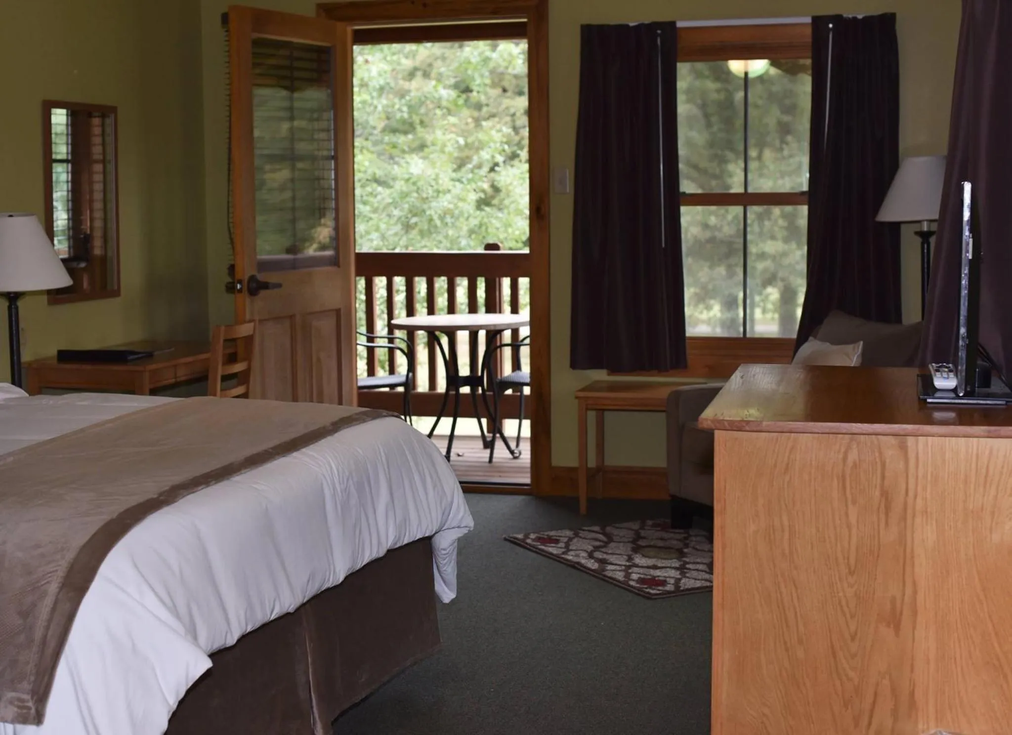 Bed in Champions Black Bear Lodge