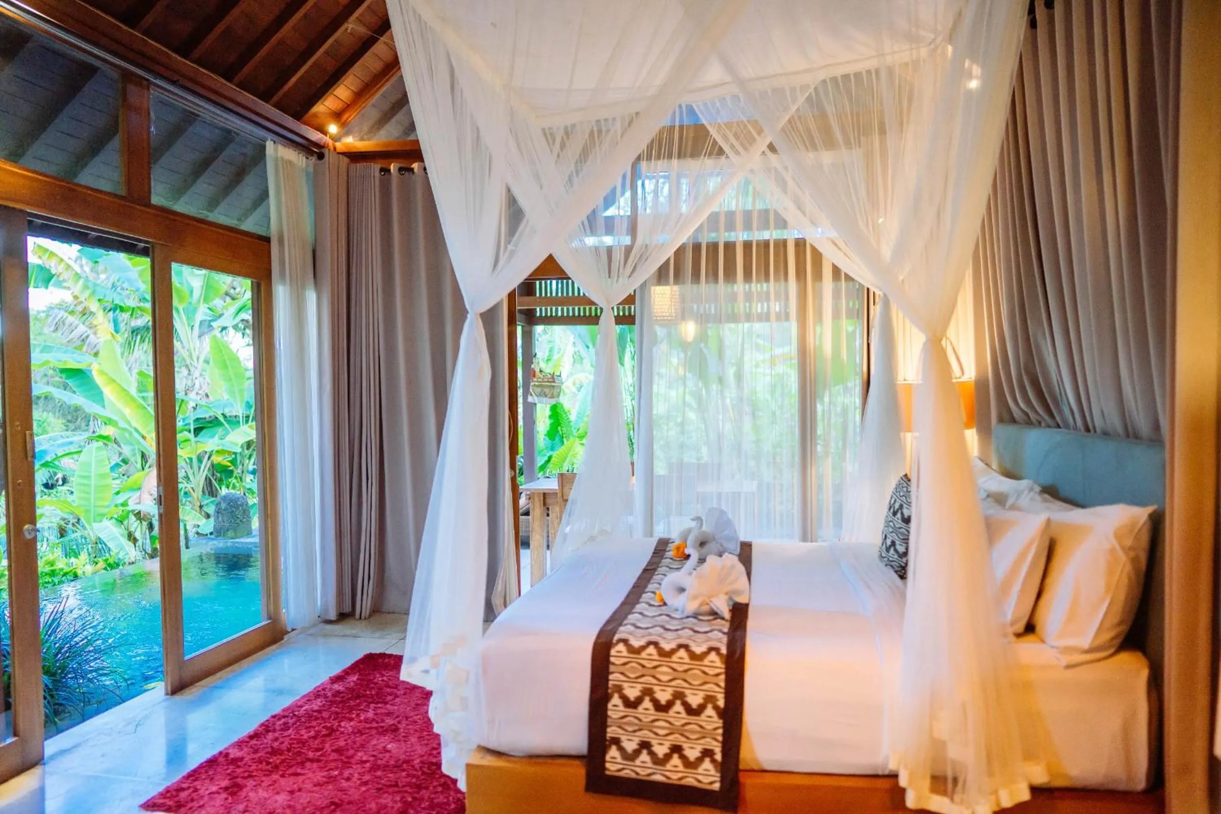 Photo of the whole room, Bed in Ume Sri Villas Ubud
