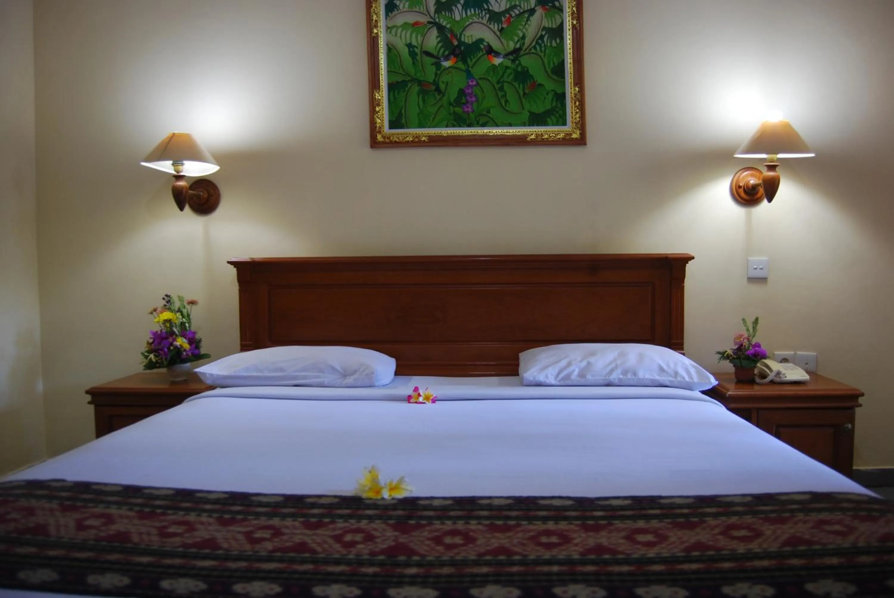 Bed in Stana Puri Gopa Hotel