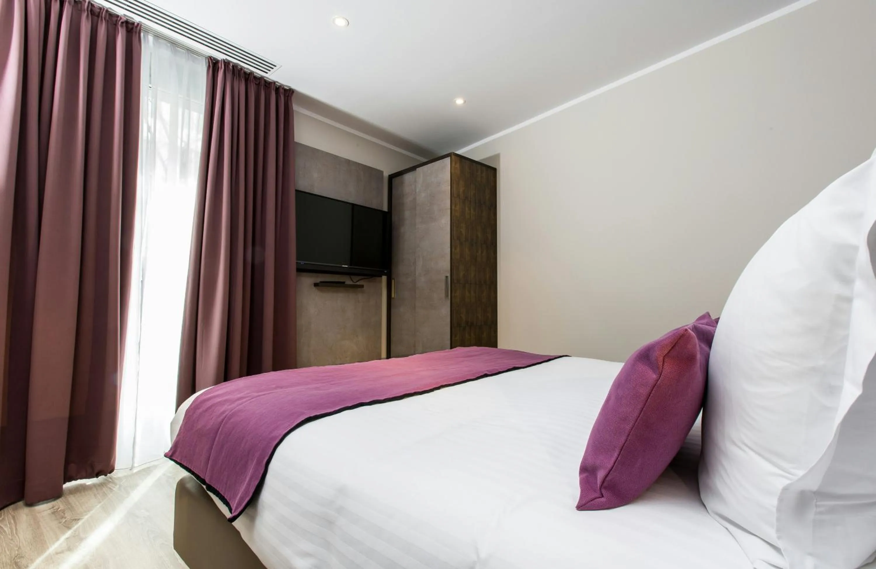 Photo of the whole room, Bed in Leonardo Boutique Hotel Barcelona Sagrada Familia